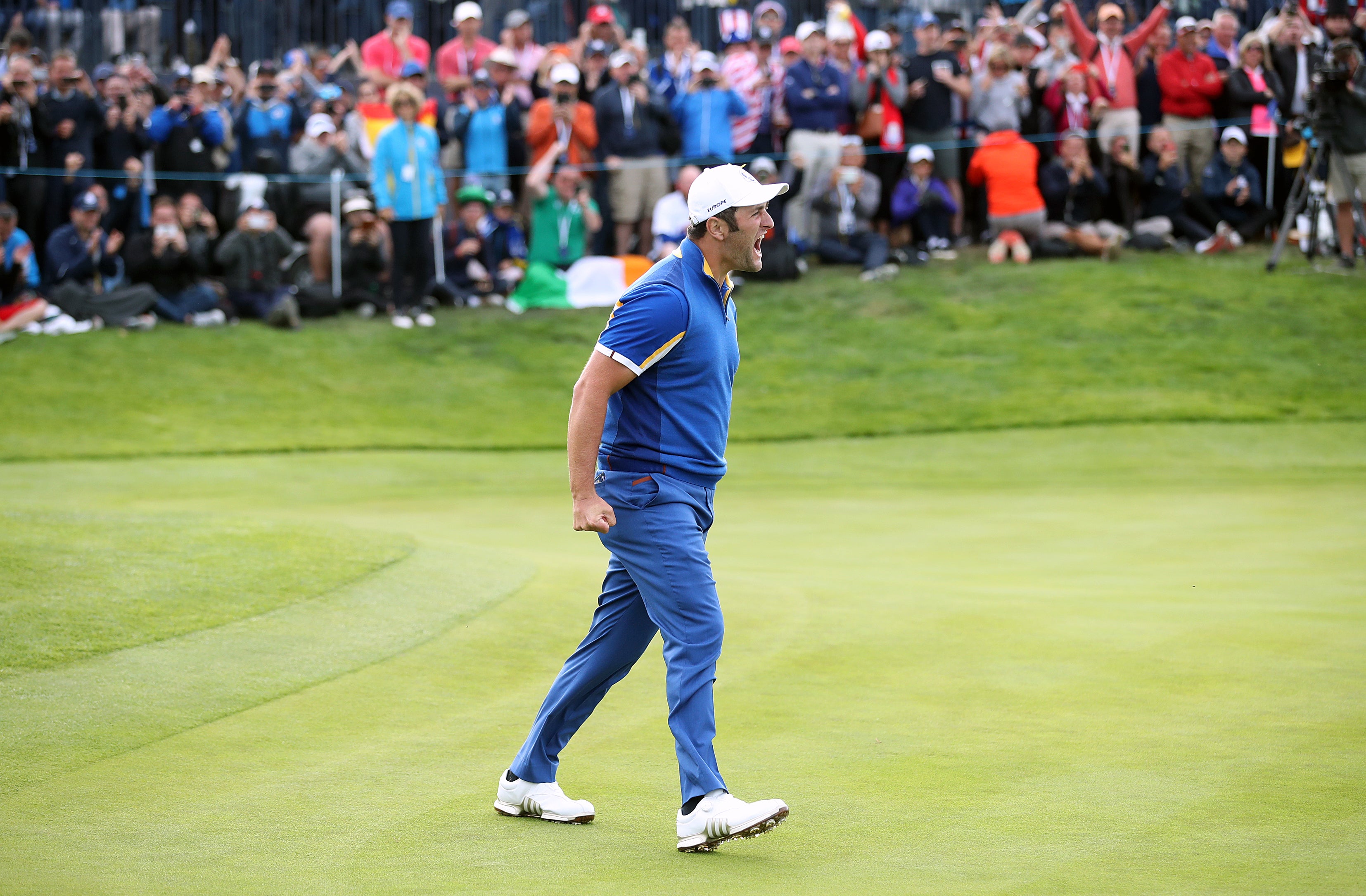 Jon Rahm celebrates beating Tiger Woods in their singles match at the 42nd Ryder Cup in Paris (Adam Davy/PA)