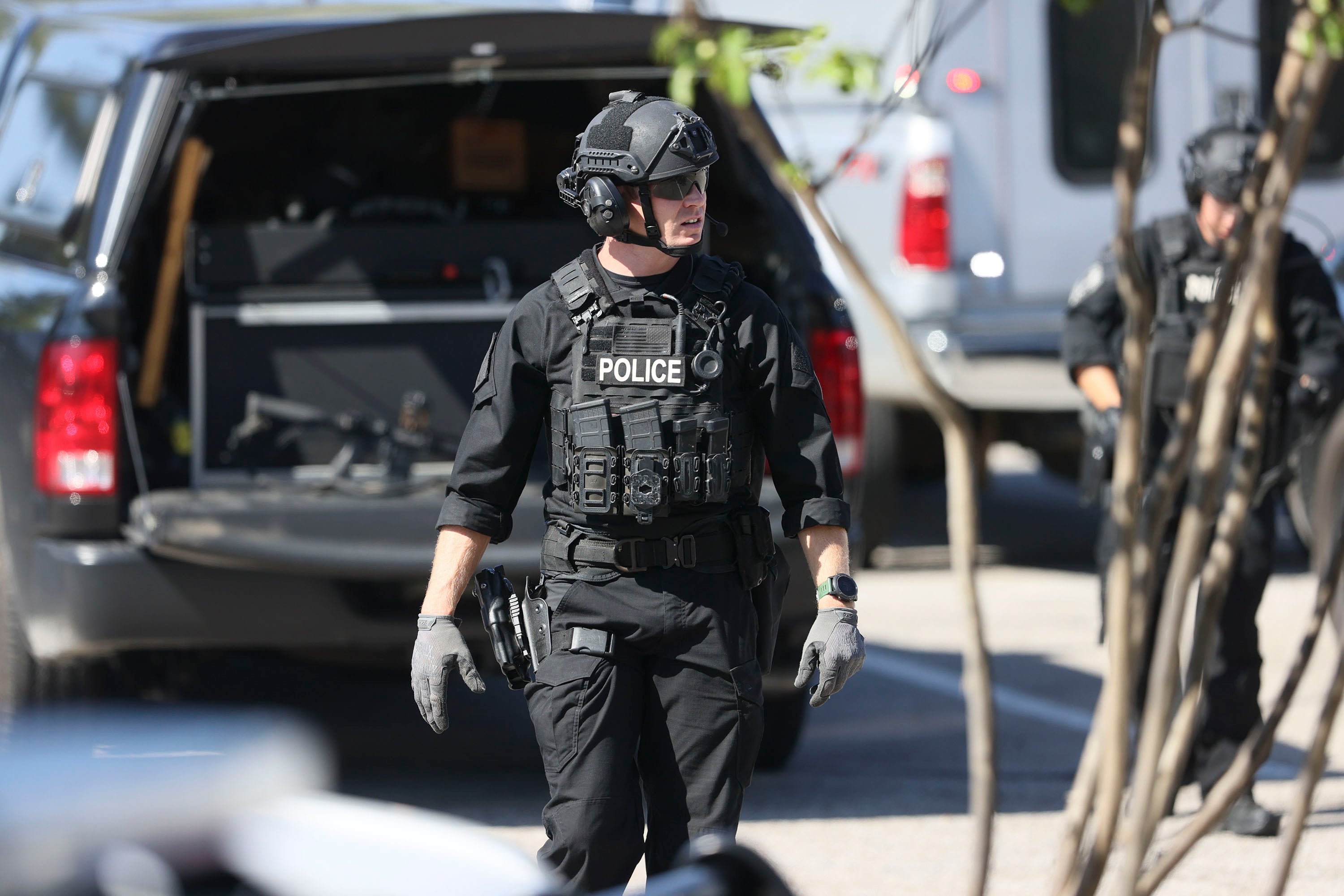 Police respond to the scene of a shooting at a Kroger’s grocery store in Collierville, Tennessee