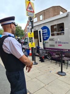 Police protect mobile vaccine units after anti-vaxxers harass staff and public