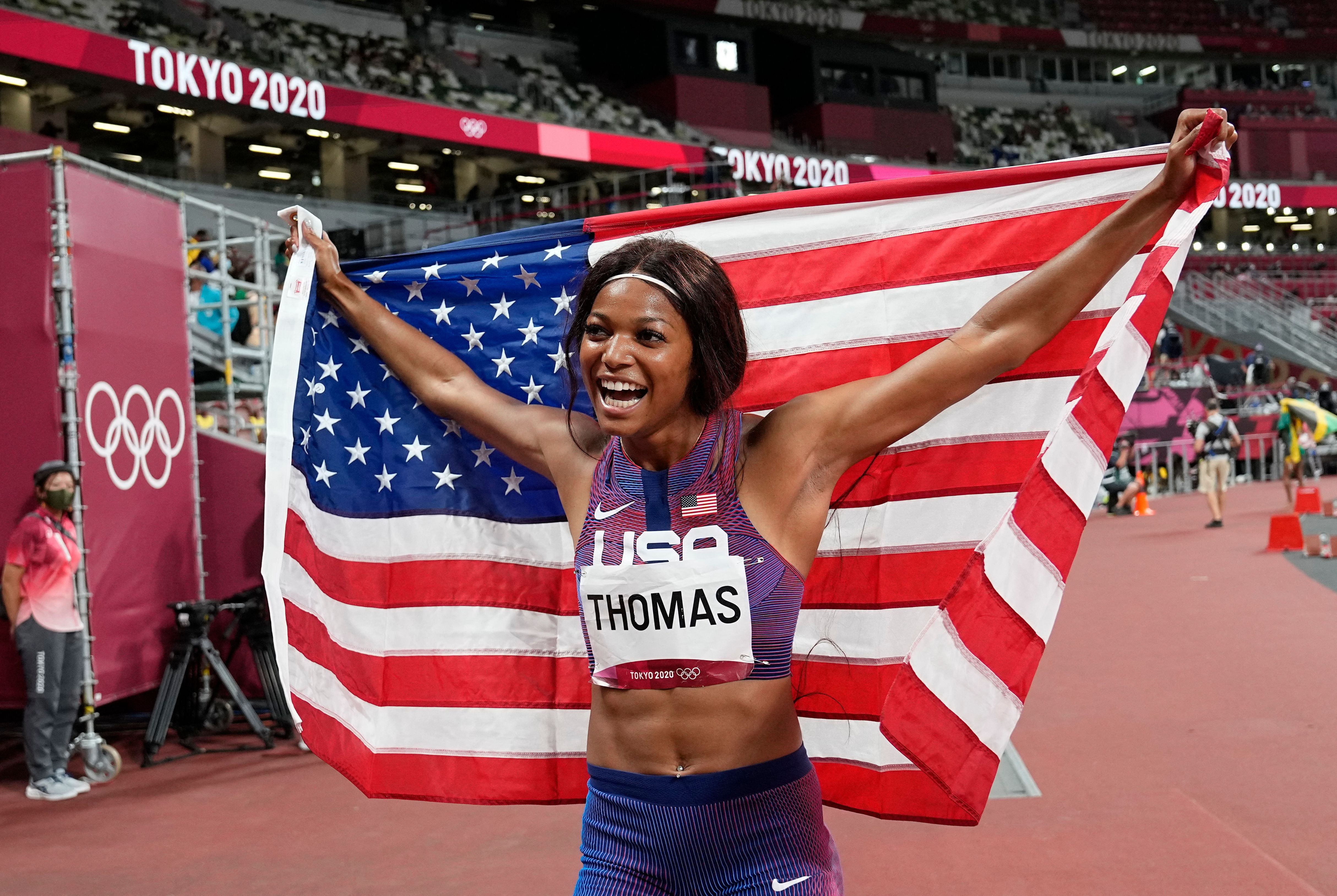 Gabby Thomas celebrates winning bronze in the women’s 200m