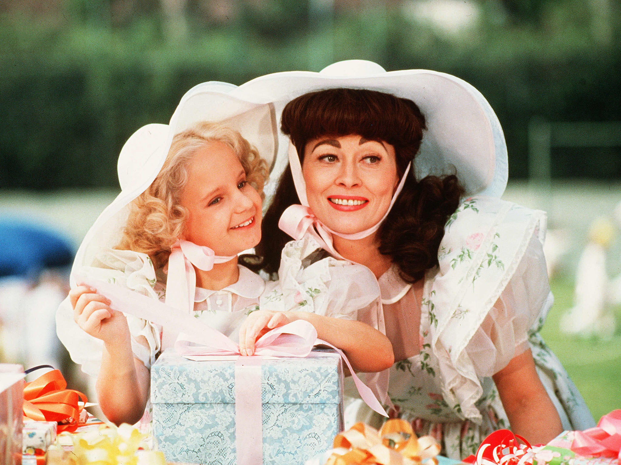 Dunaway as Joan Crawford (alongside Mara Hobel) in ‘Mommie Dearest'