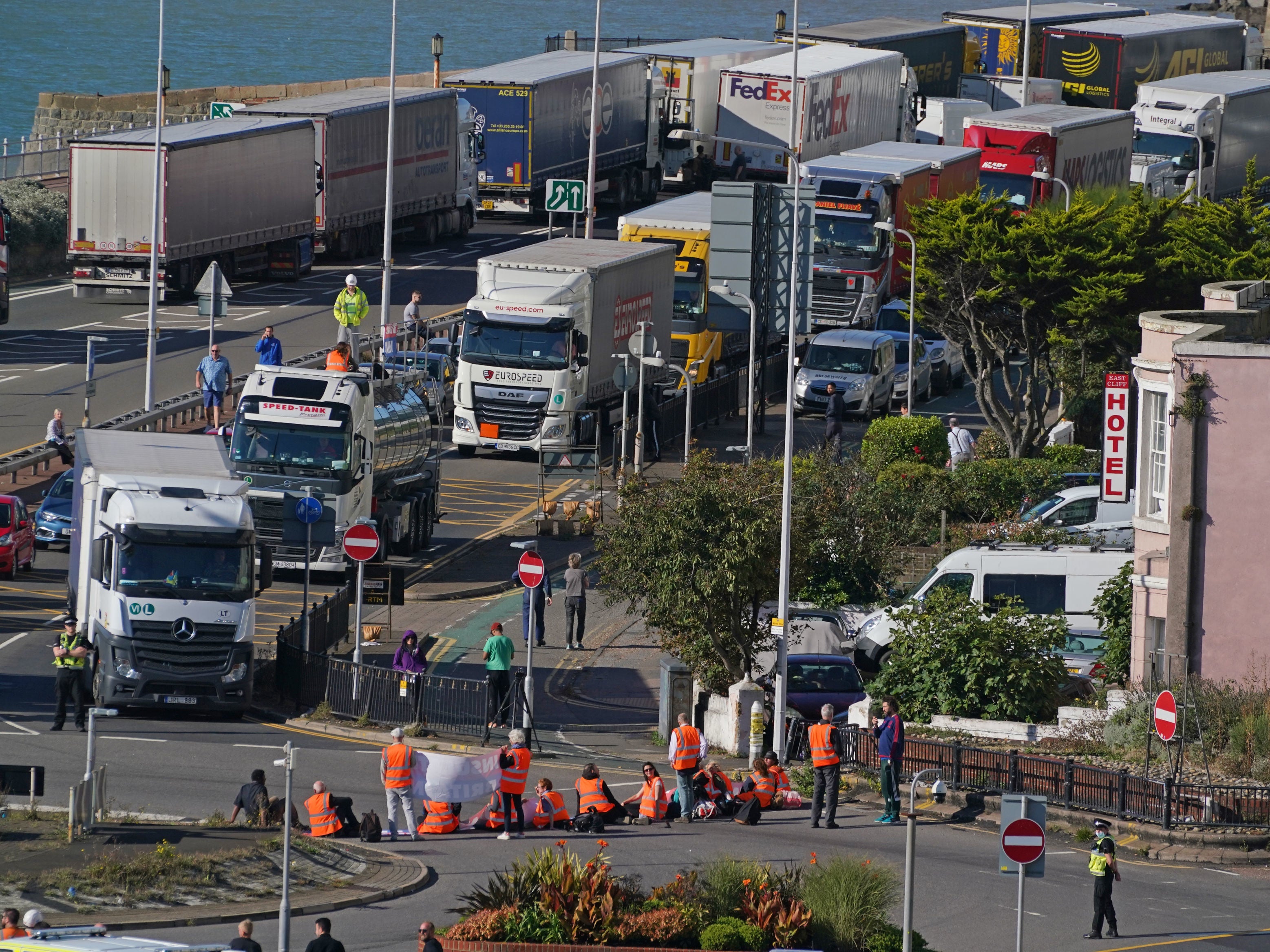 Protesters from Insulate Britain block the A20 in Kent, which provides access to the Port of Dover in Kent