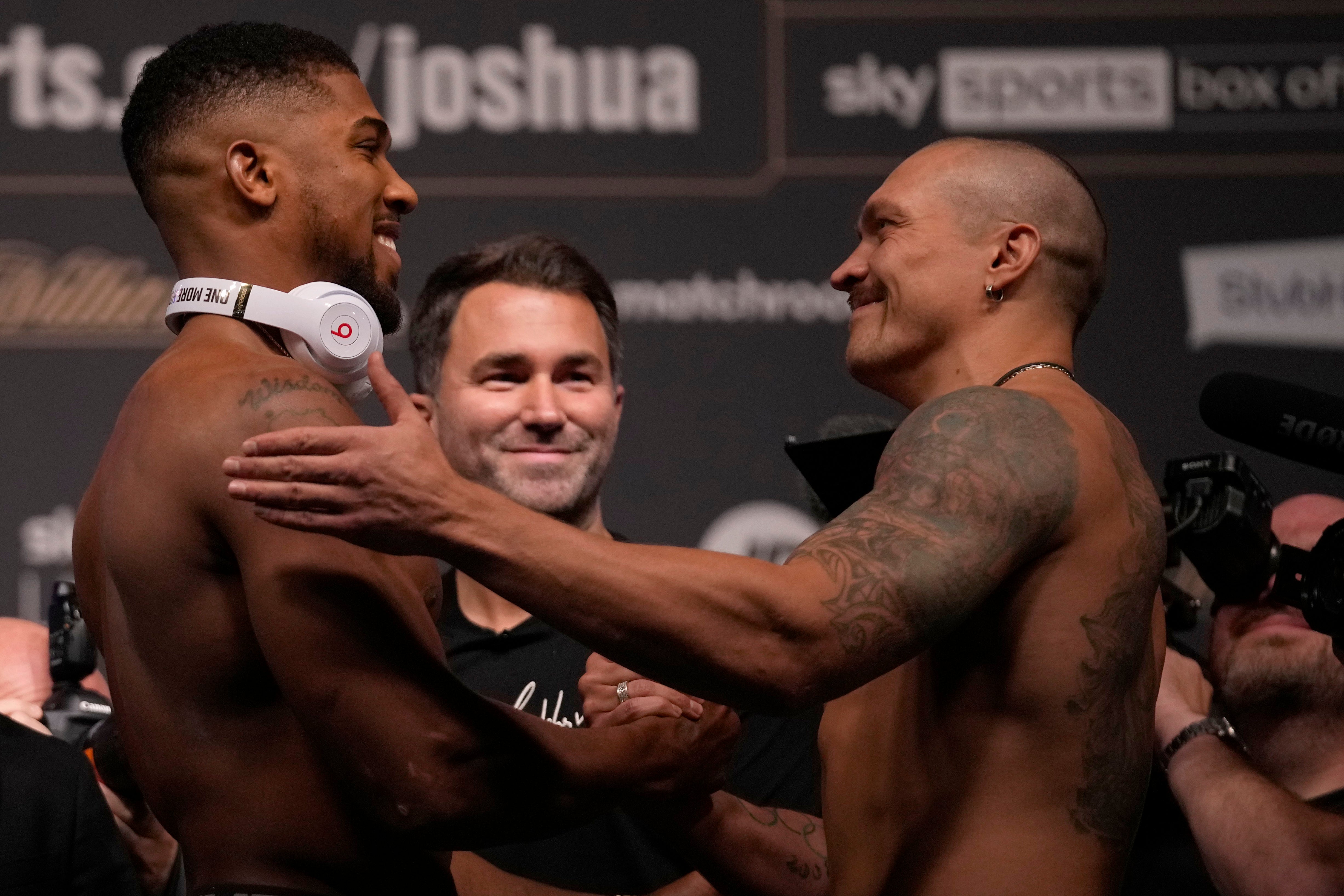 Joshua and Usyk exchange pleasantries at the weigh-in