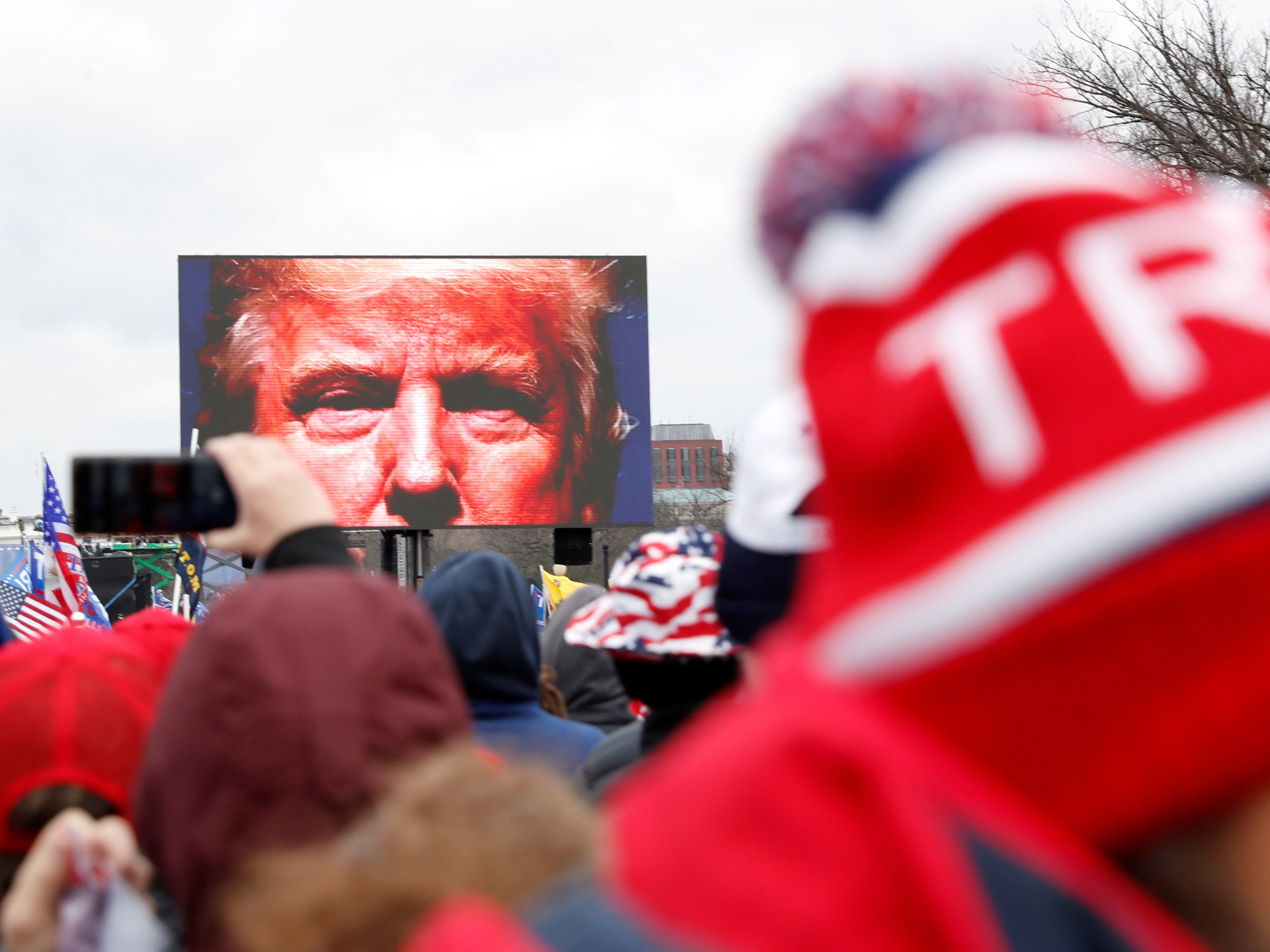 Georgia secretary of state says Trump ‘knows in his heart’ he lost election as former president holds rally