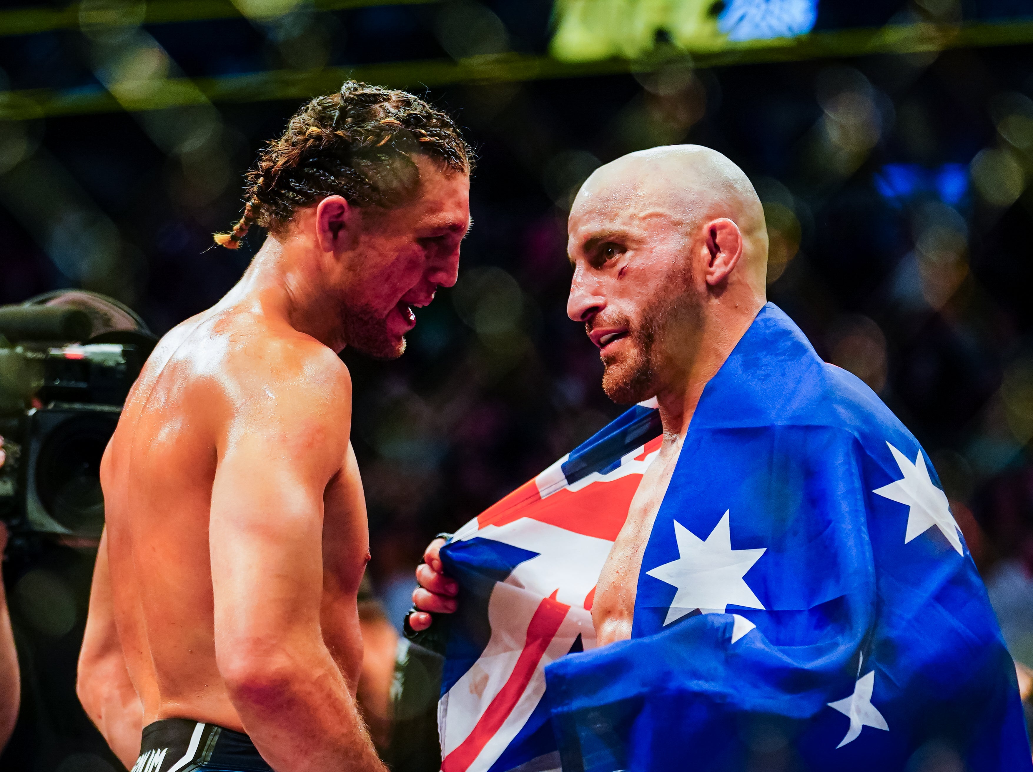 Alexander Volkanovski (right) after retaining his title against Brian Ortega