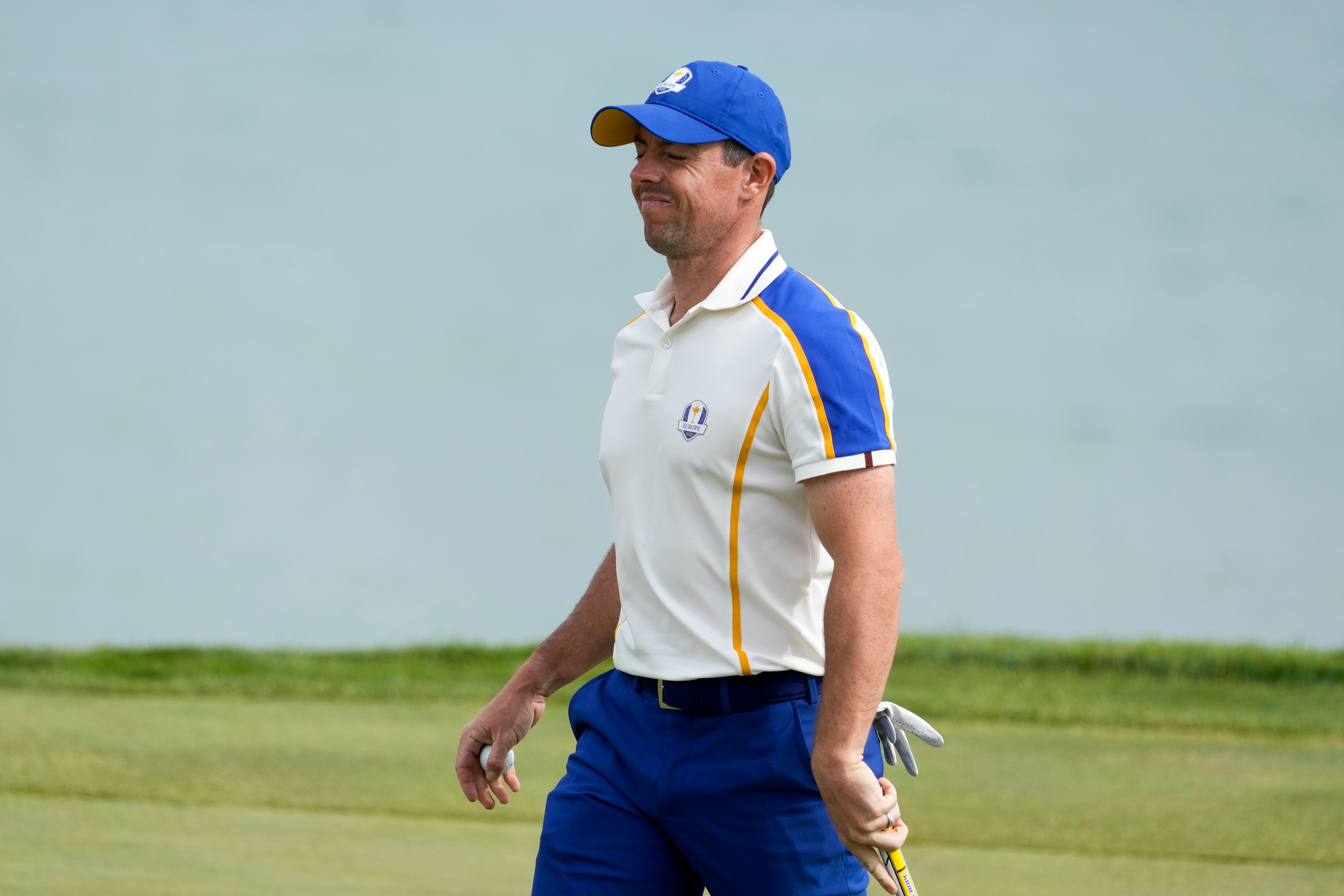 Rory McIlroy choked back tears after winning his singles match at the Ryder Cup (Charlie Neibergall/AP).