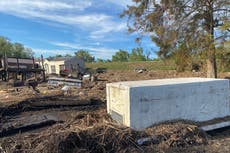 Hurricane Ida swept away coffins in a Black town outside the levee system – and residents are still pleading for help