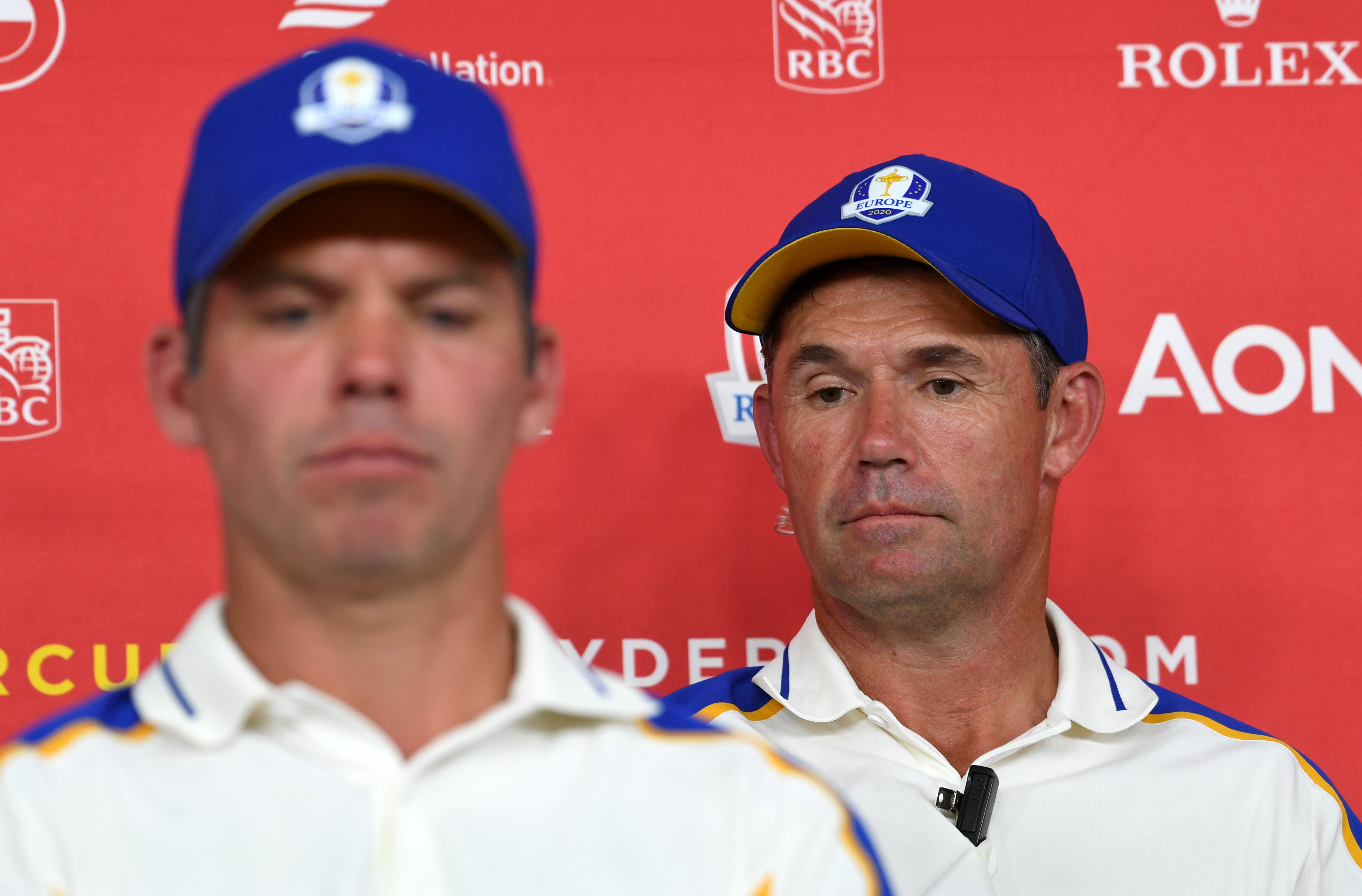 Team Europe captain Padraig Harrington, at right alongside Paul Casey, during a press conference after their heavy defeat to Team USA (Anthony Behar/PA)