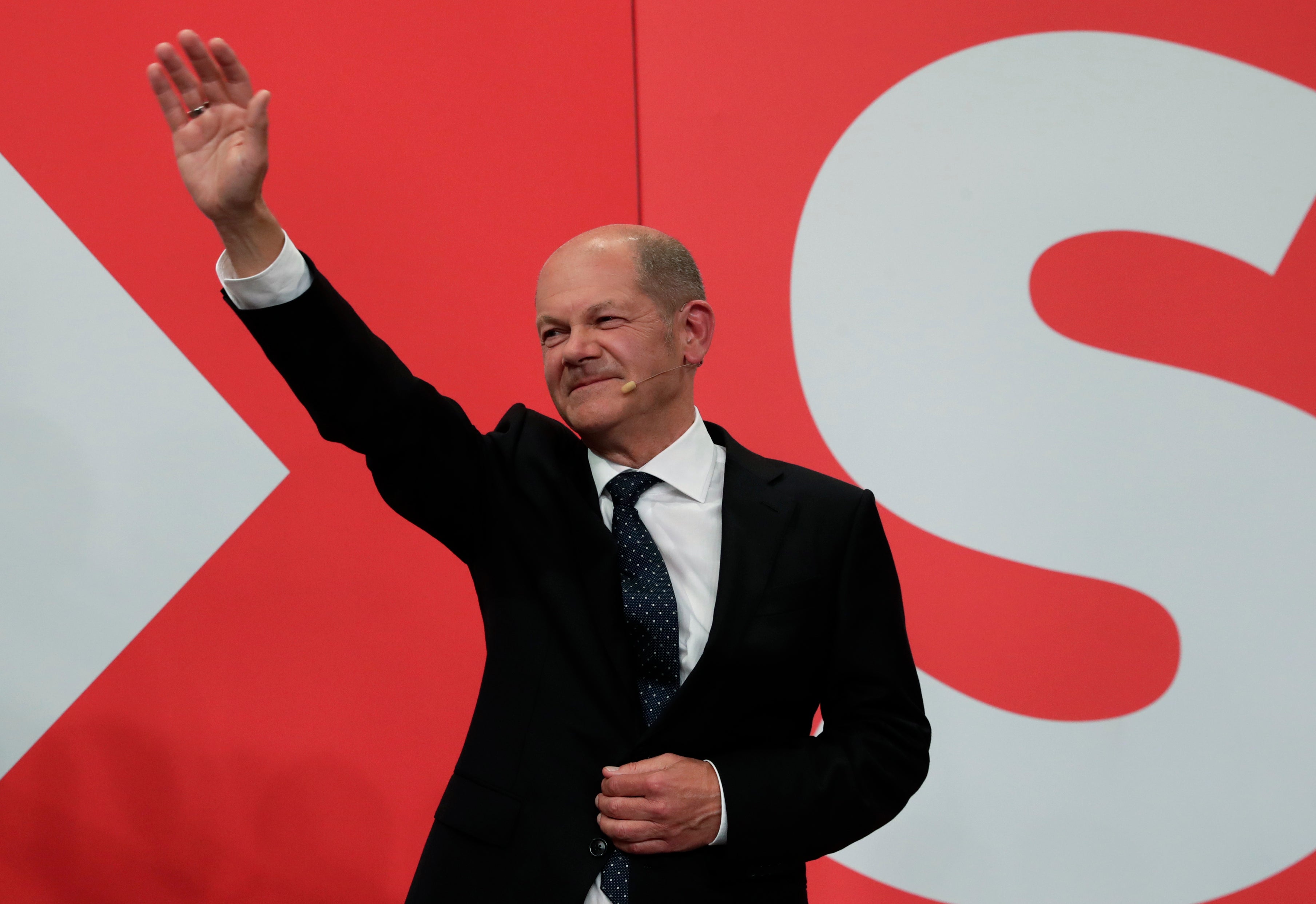 SPD leader Olaf Scholz now seems poised to become Merkel’s successor — but exit polls put the parties neck and neck