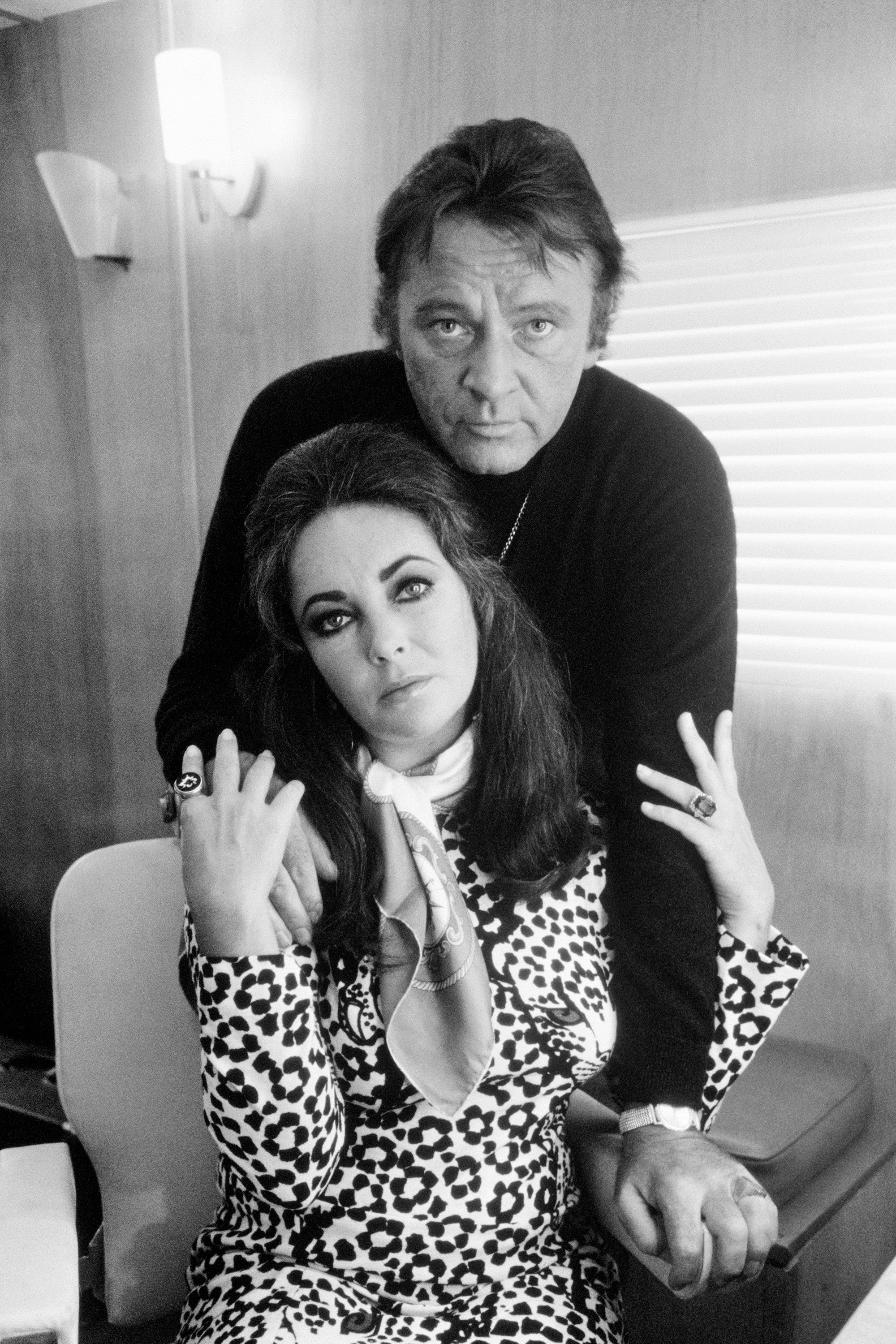 Richard Burton with his wife, Elizabeth Taylor, in his trailer on location in Hounslow, London, 1971, during the filming of ‘Villain’, directed by Michael Tuchner