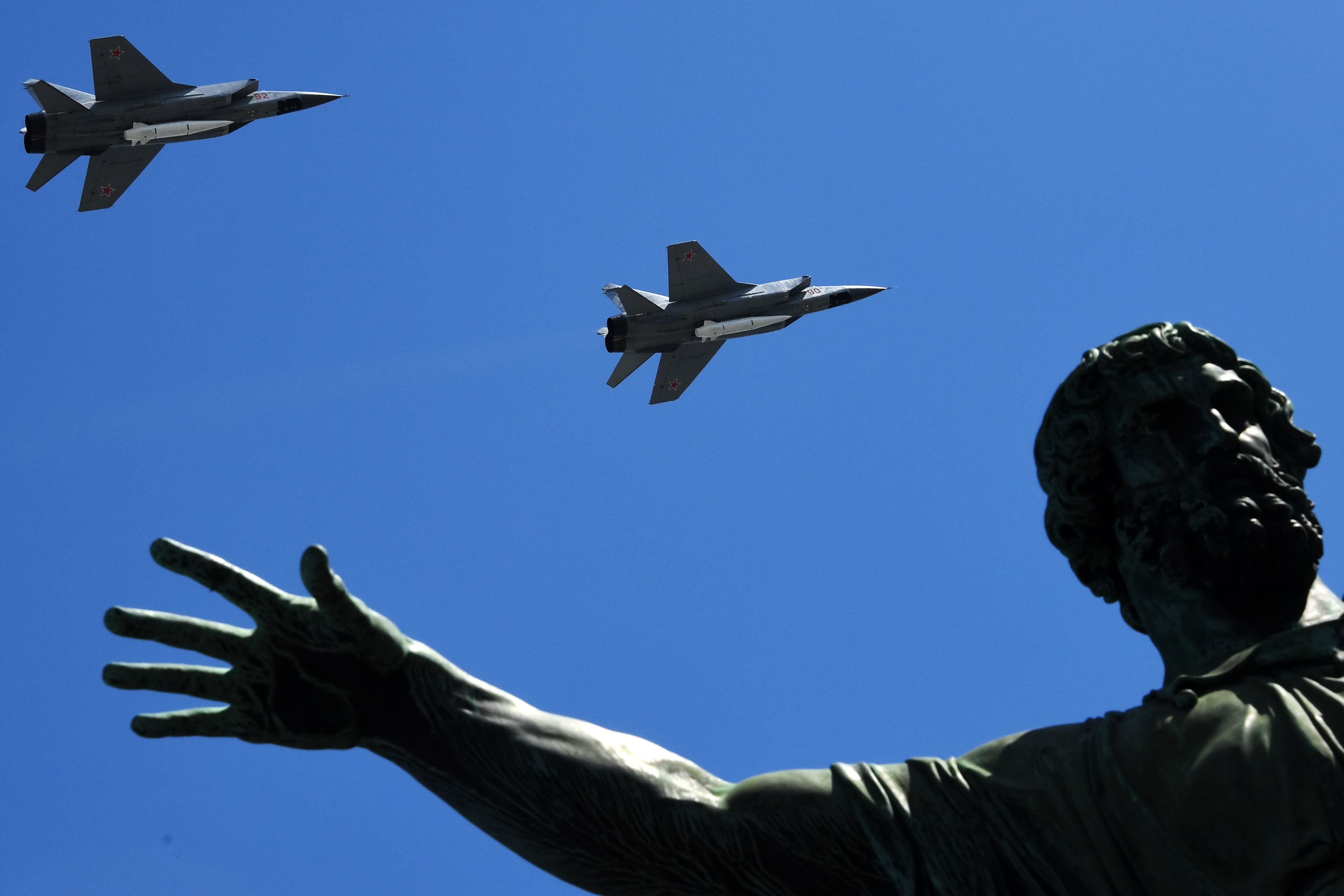 Russia’s MiG-31 supersonic interceptor jets carrying hypersonic missiles fly over Red Square during the Victory Day military parade in Moscow, 2018