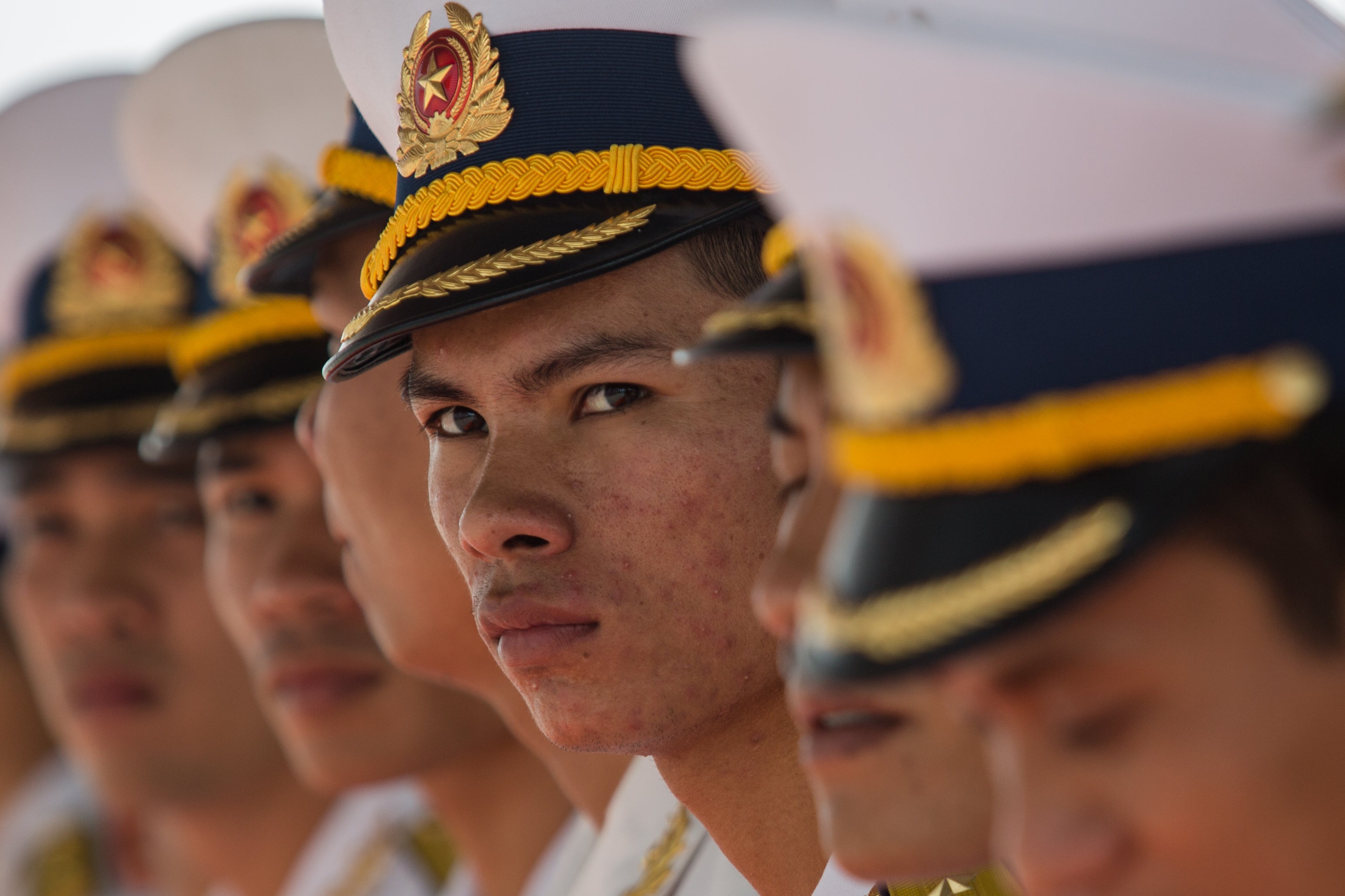 Vietnamese soldiers during a 2018 ceremony welcoming two French navy amphibious assault ships to Ho Chi Minh City as the two countries celebrate the anniversary of their diplomatic ties