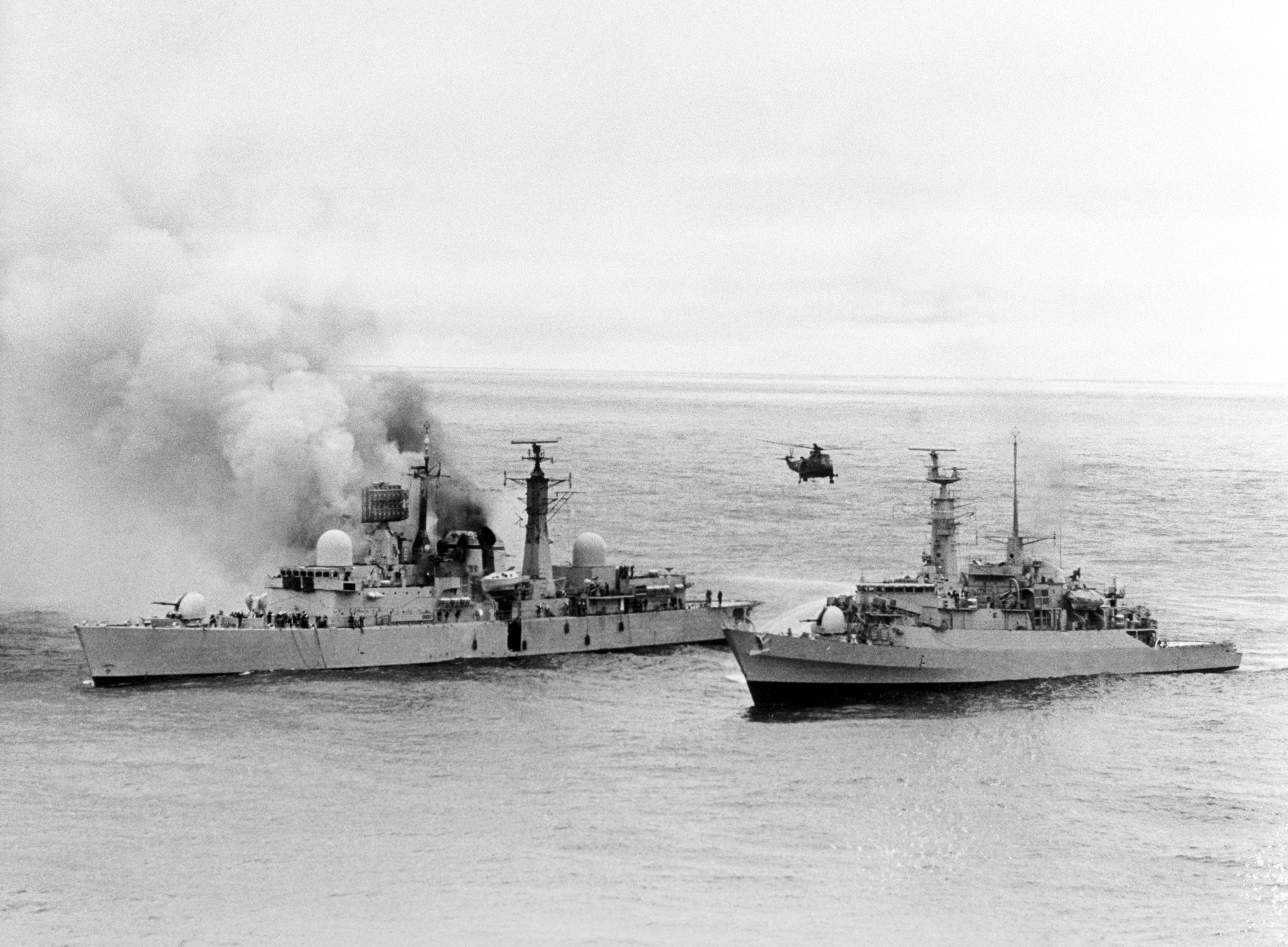 The stricken HMS Sheffield, smoke pouring out after it was hit by an Exocet missile during the Falklands coflict – she later sank with the loss of 20 lives