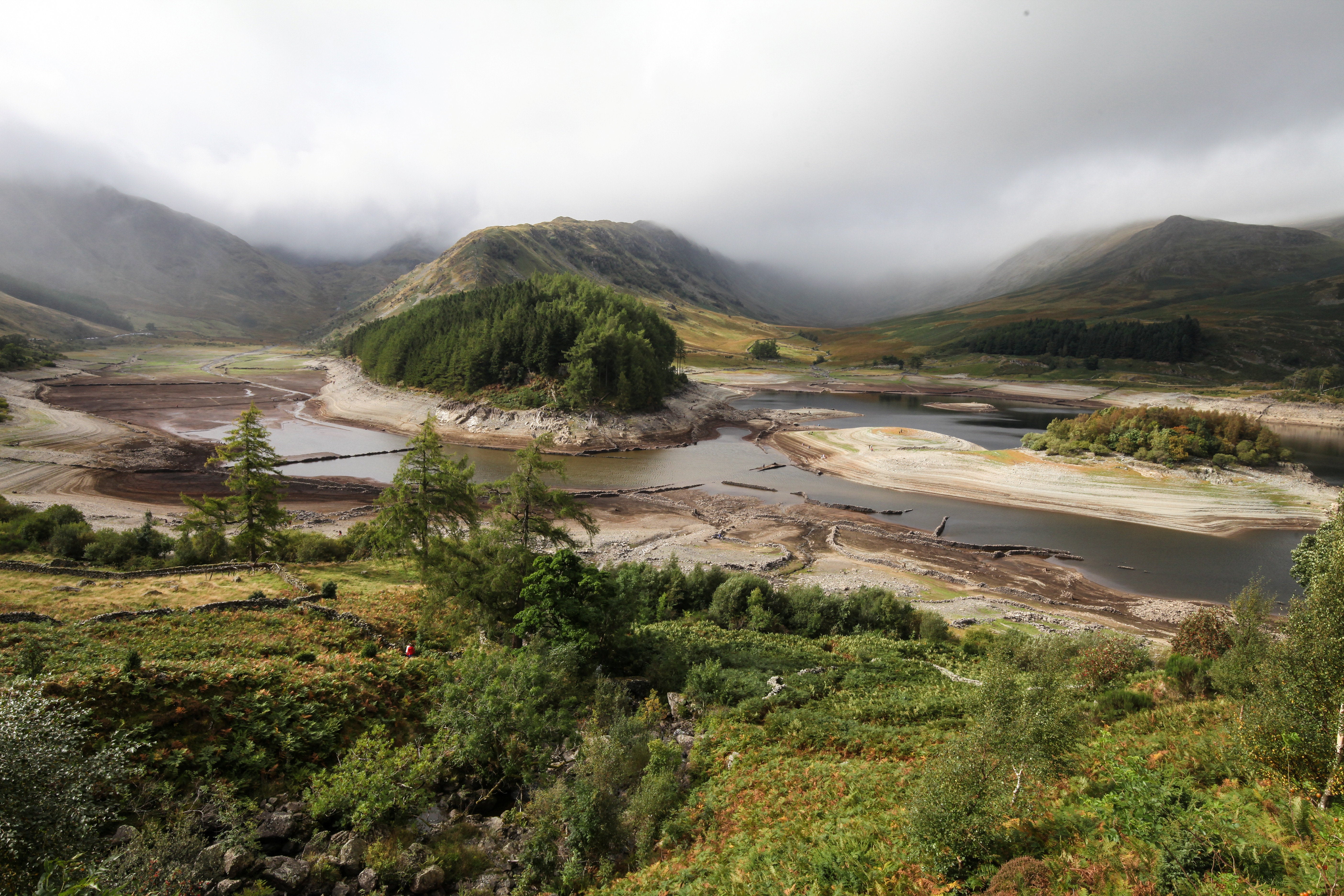 A hidden village in the Lake District deliberately flooded to create a reservoir in the 1930s has dramatically reappeared due to falling water levels