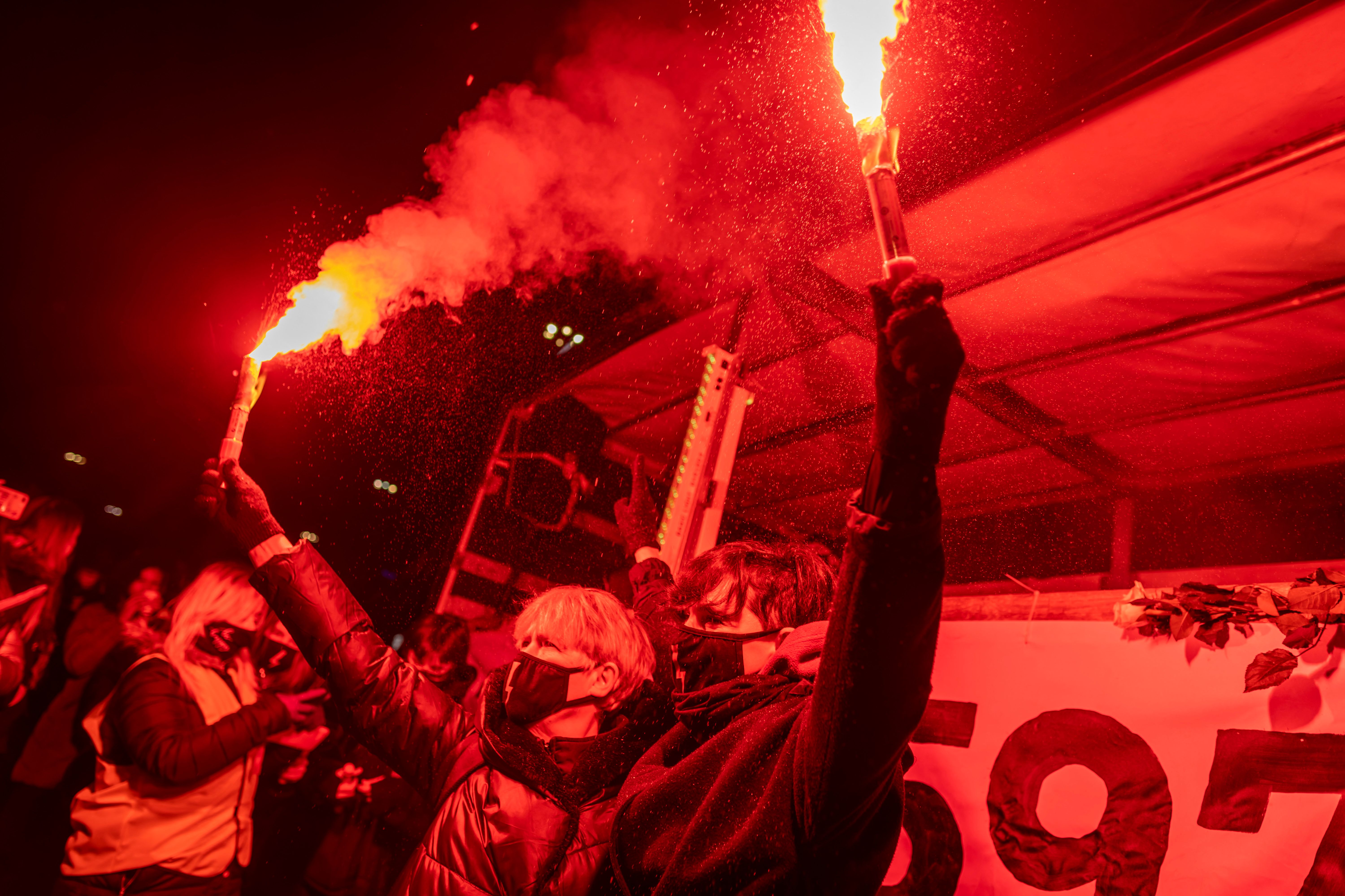 Demonstrators protest against Poland’s near-total ban on abortion on International Women’s Day in March 2021