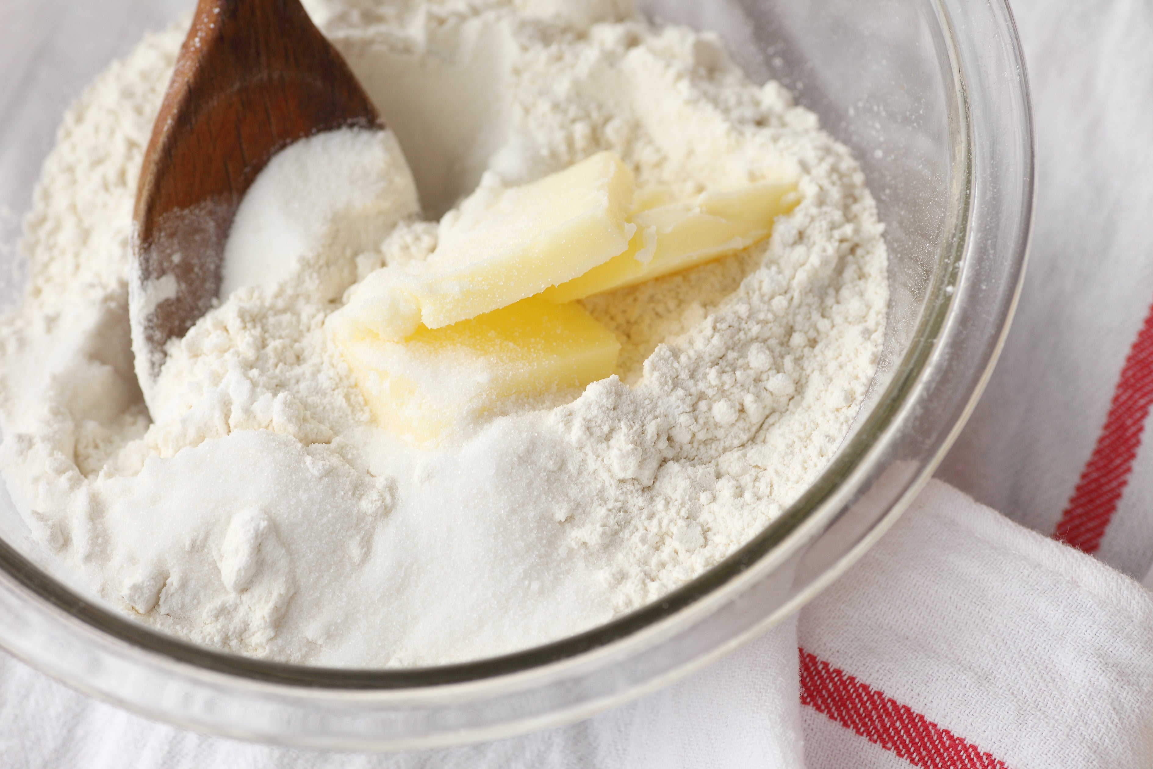 Squeezing dry ingredients into butter allows you to experience how flour meets fat, to learn how to stop as soon as you feel everything form a sandy, putty-soft dough