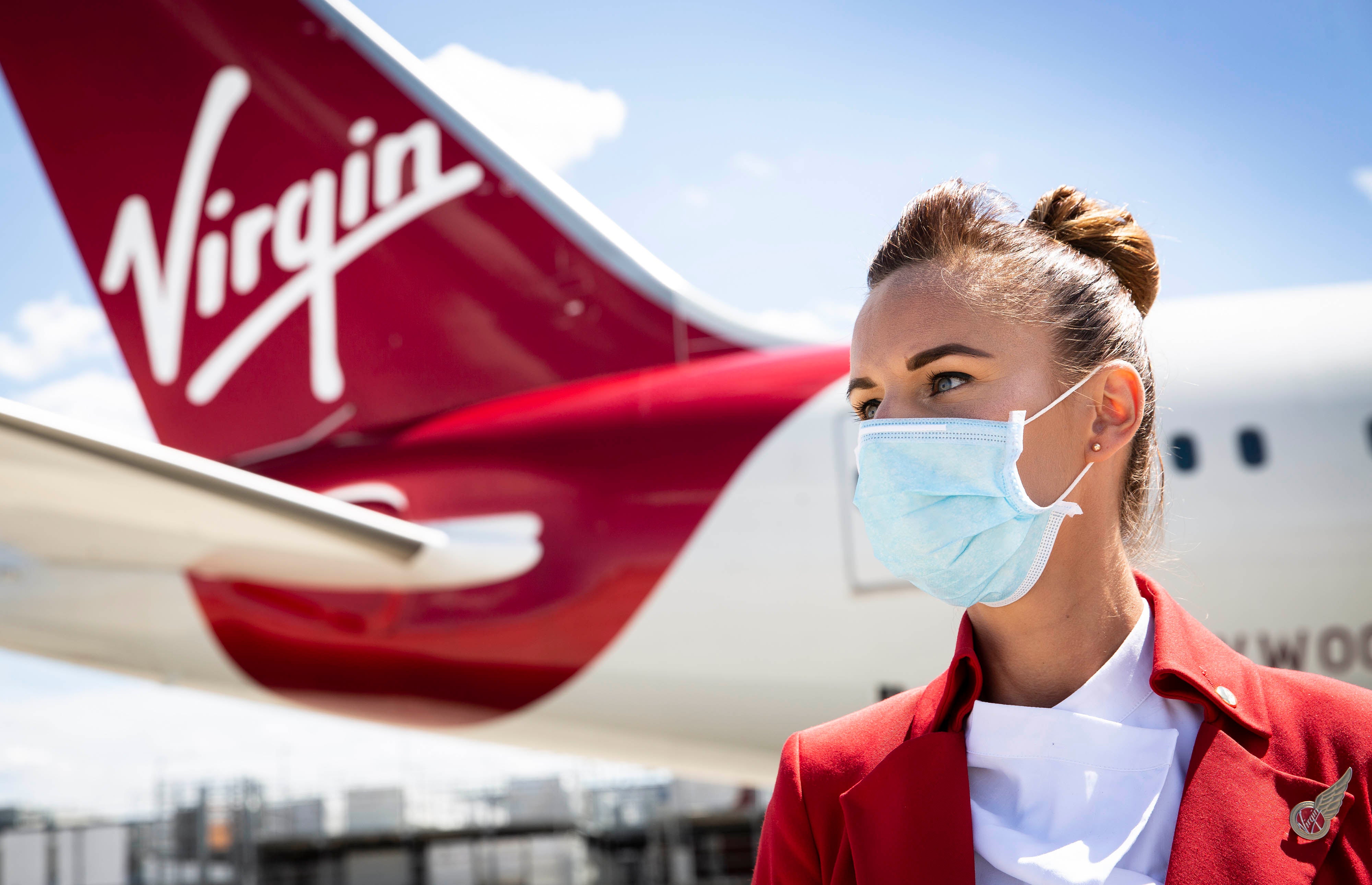 Virgin Atlantic has announced it will not hire new cabin crew or pilots who are not fully vaccinated against coronavirus (Matt Alexander/PA)