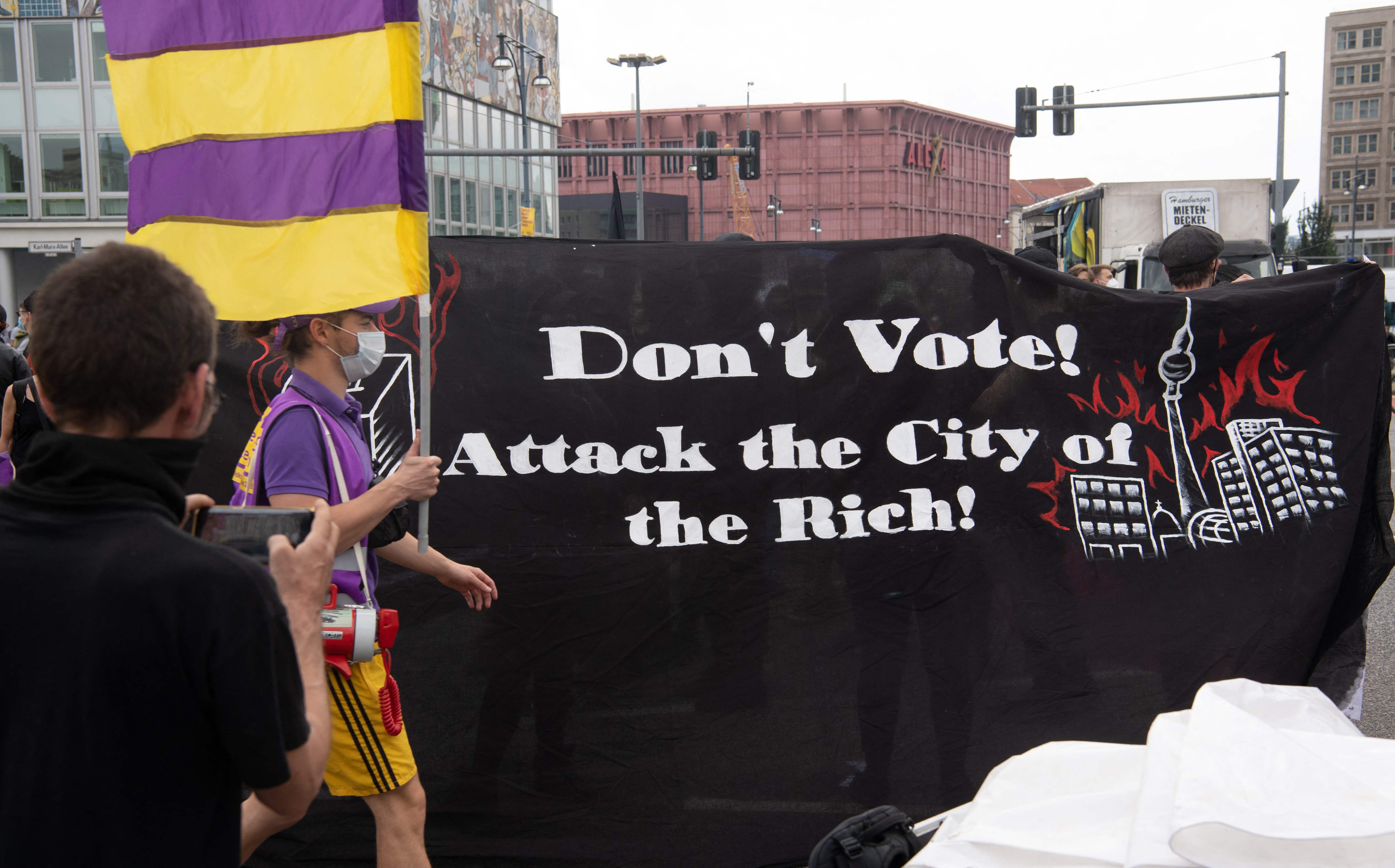 Earlier in September, demonstrators take part in a protest against the soaring living costs of tenants