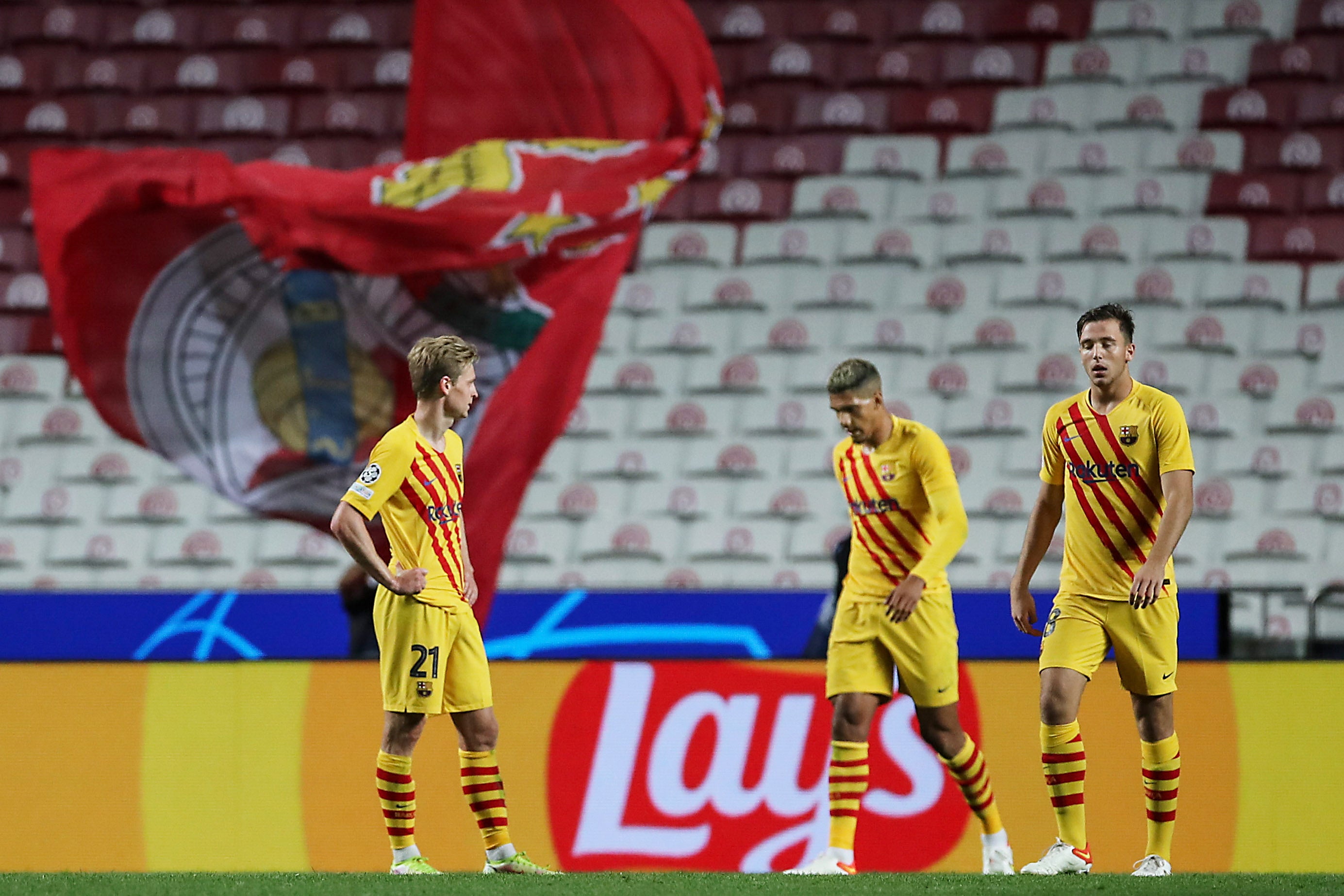 From left: Frankie de Jong , Sergino Dest and Nico Gonzalez react in Lisbon