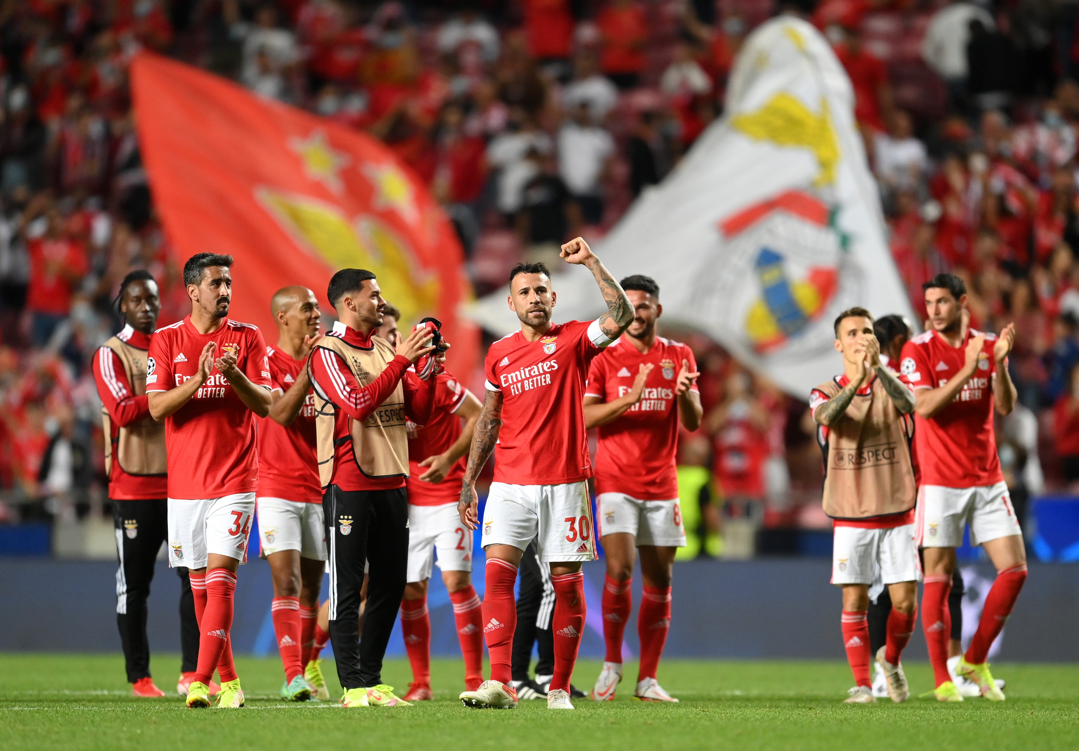 Nicolas Otamendi, centre, celebrates with his Benfica teammates