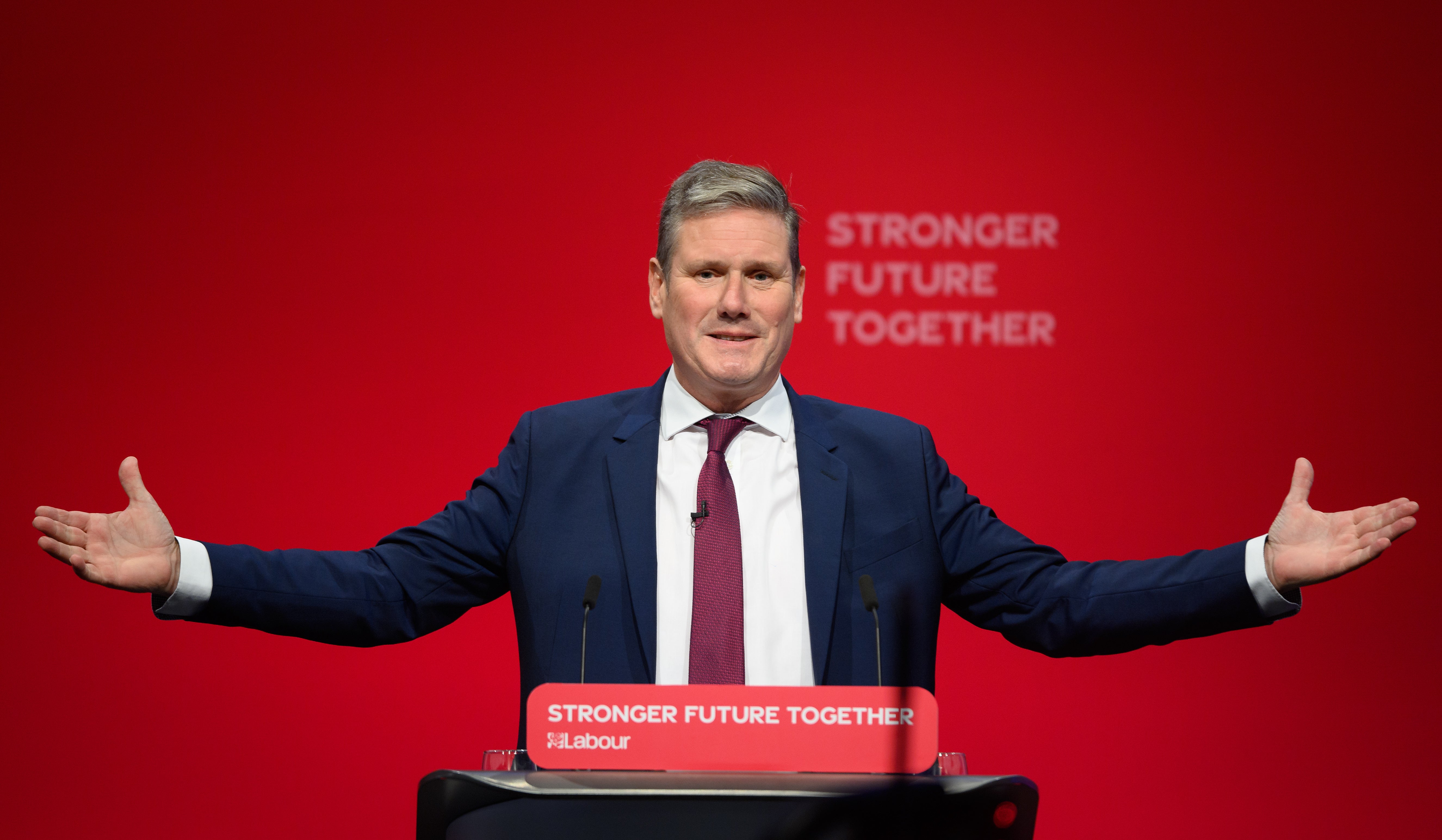 Welcomed with open arms? Starmer during his first in-person speech to conference