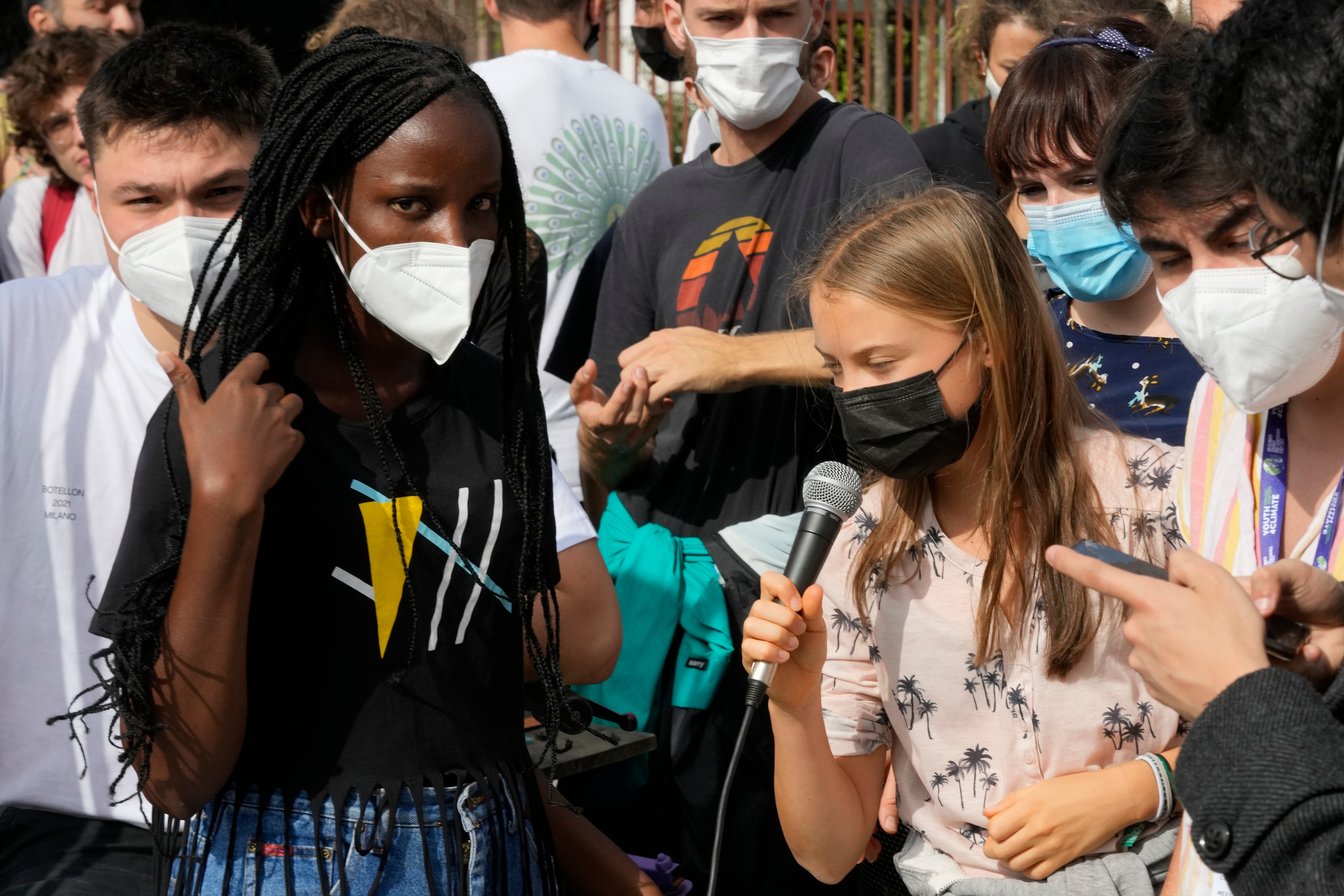 Vanessa Nakate with Greta Thunberg at a youth climate summit in Italy