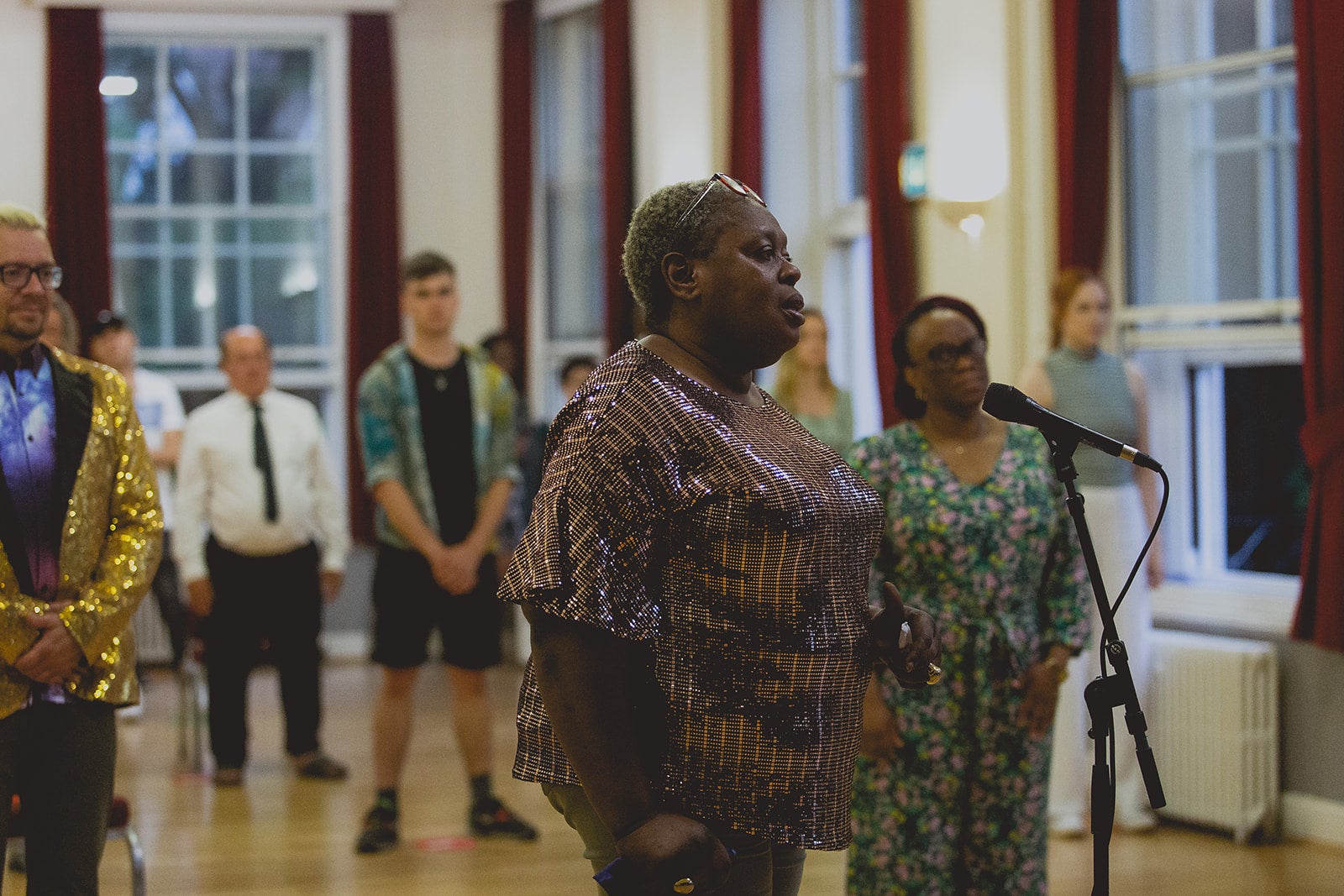 Choir members performing at a Citizens of the World concert during Refugee Week