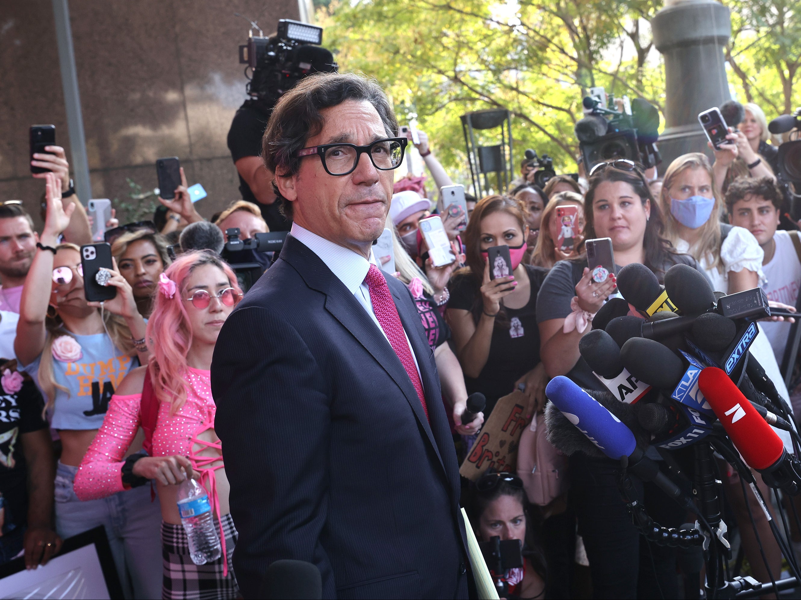 Britney Spears’s attorney Mathew Rosengart speaks to the press and #FreeBritney activists after a hearing on 29 September 2021 in Los Angeles