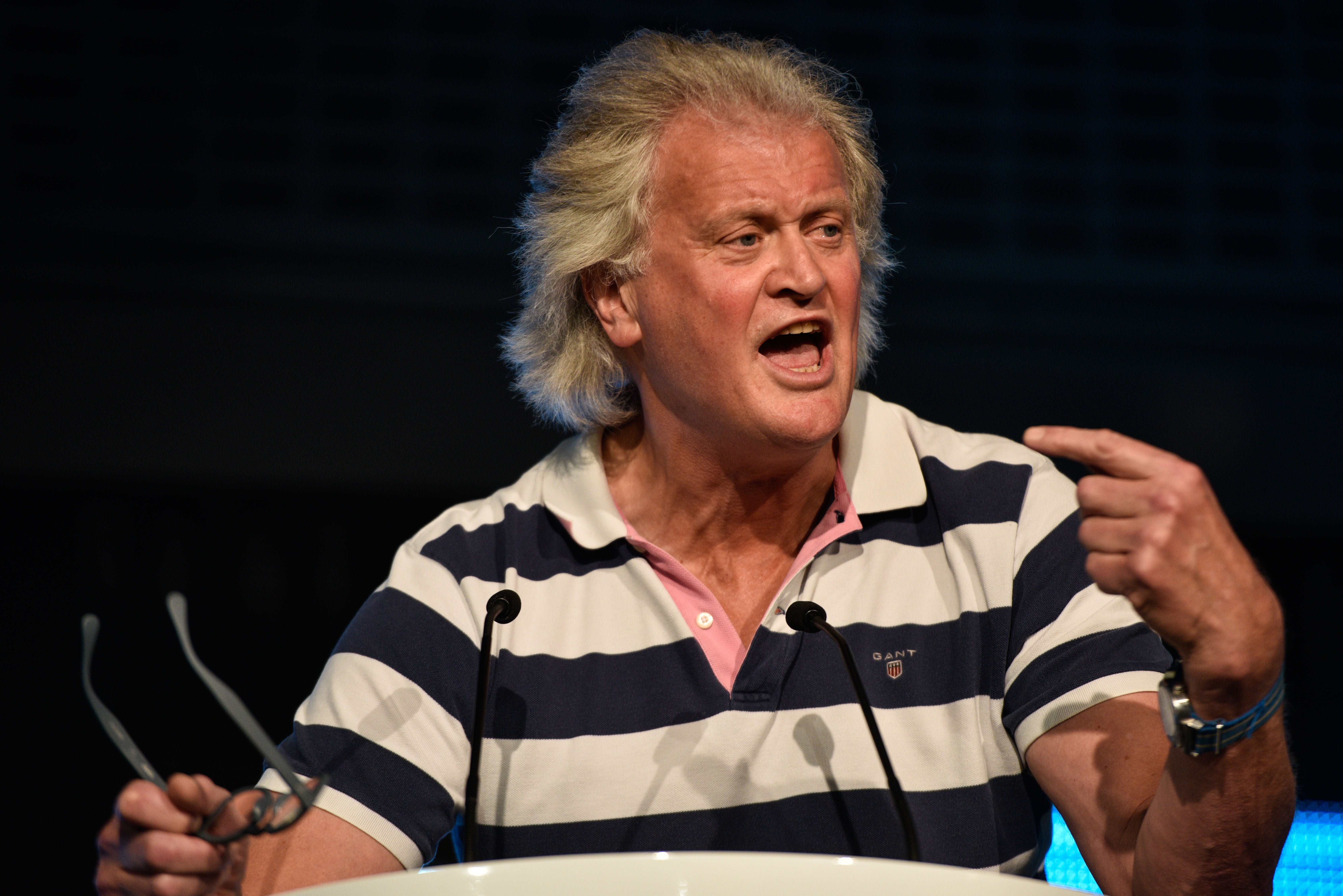 Wetherspoons pub founder Tim Martin talks at a Brexit Party rally on October 18, 2019