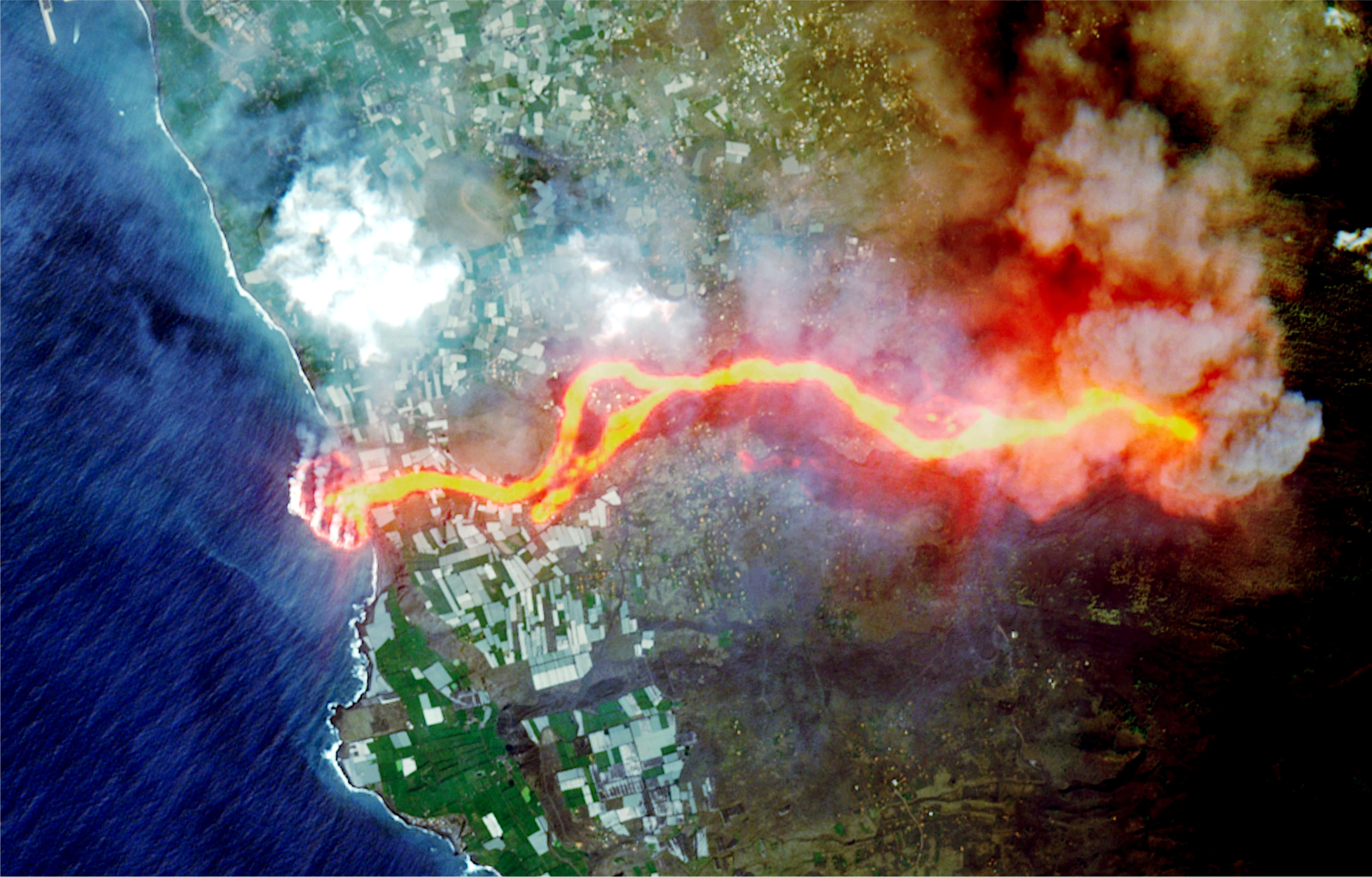 Satellite picture shows lava flow snaking towards the sea