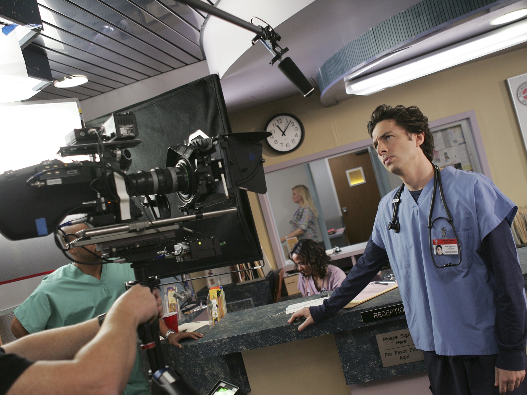 Zach Braff is directed on the set of ‘Scrubs'