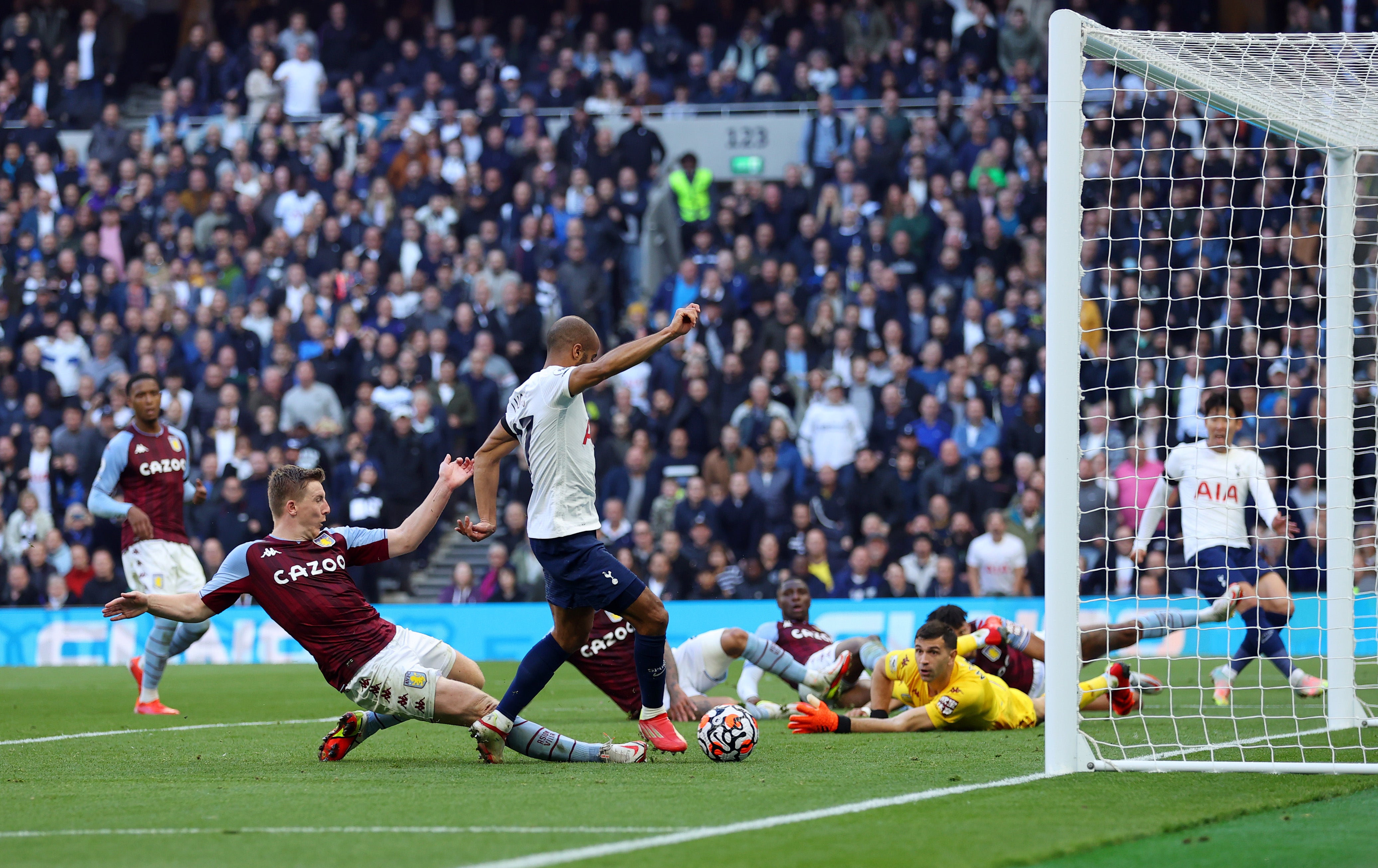 Matt Targett gets to the ball before Lucas Moura but only succeeds in putting it into his own net