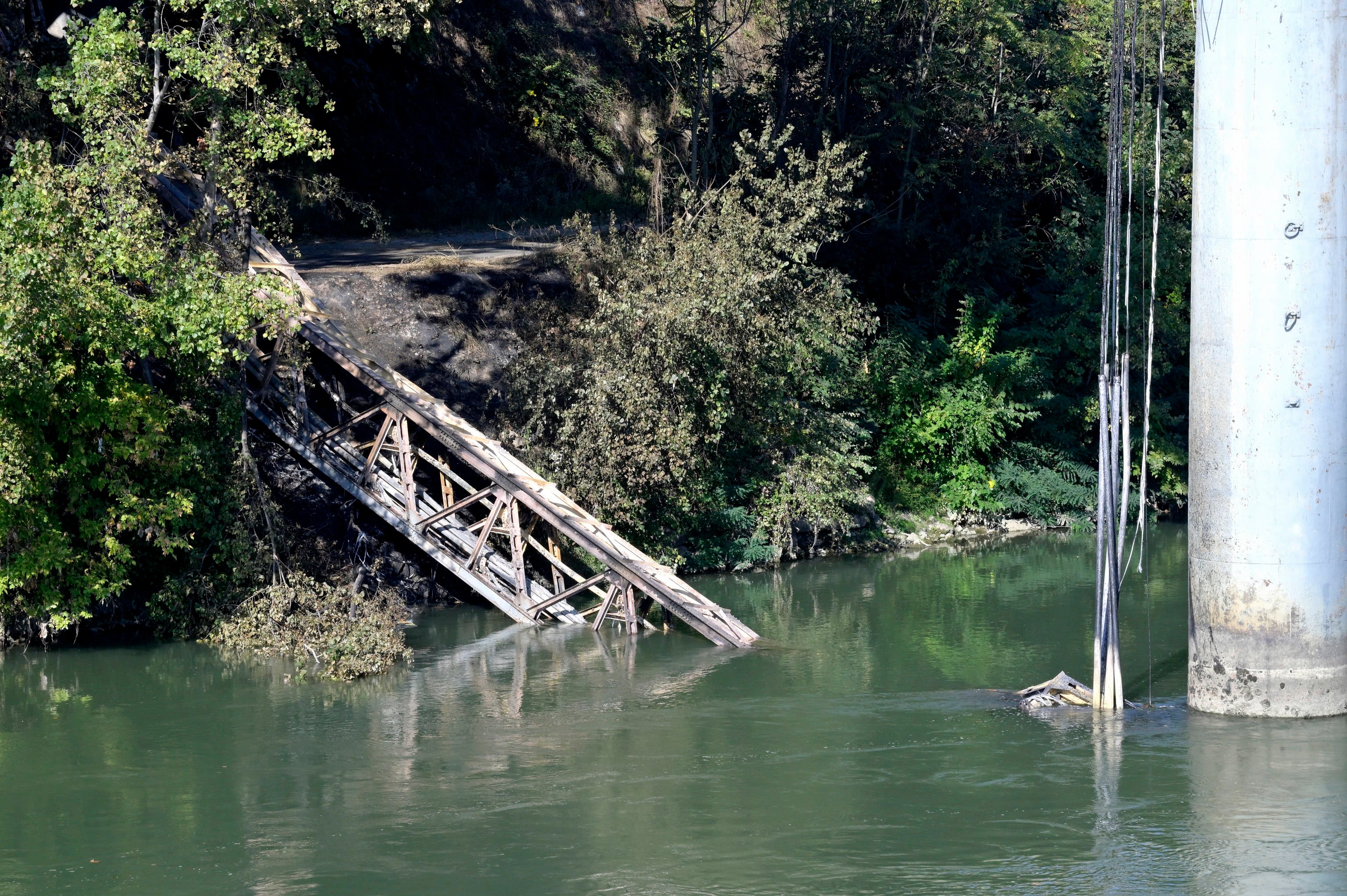 A part of the historic bridge Ponte dell’Industria, or Ponte di Ferro, which collapsed into the river