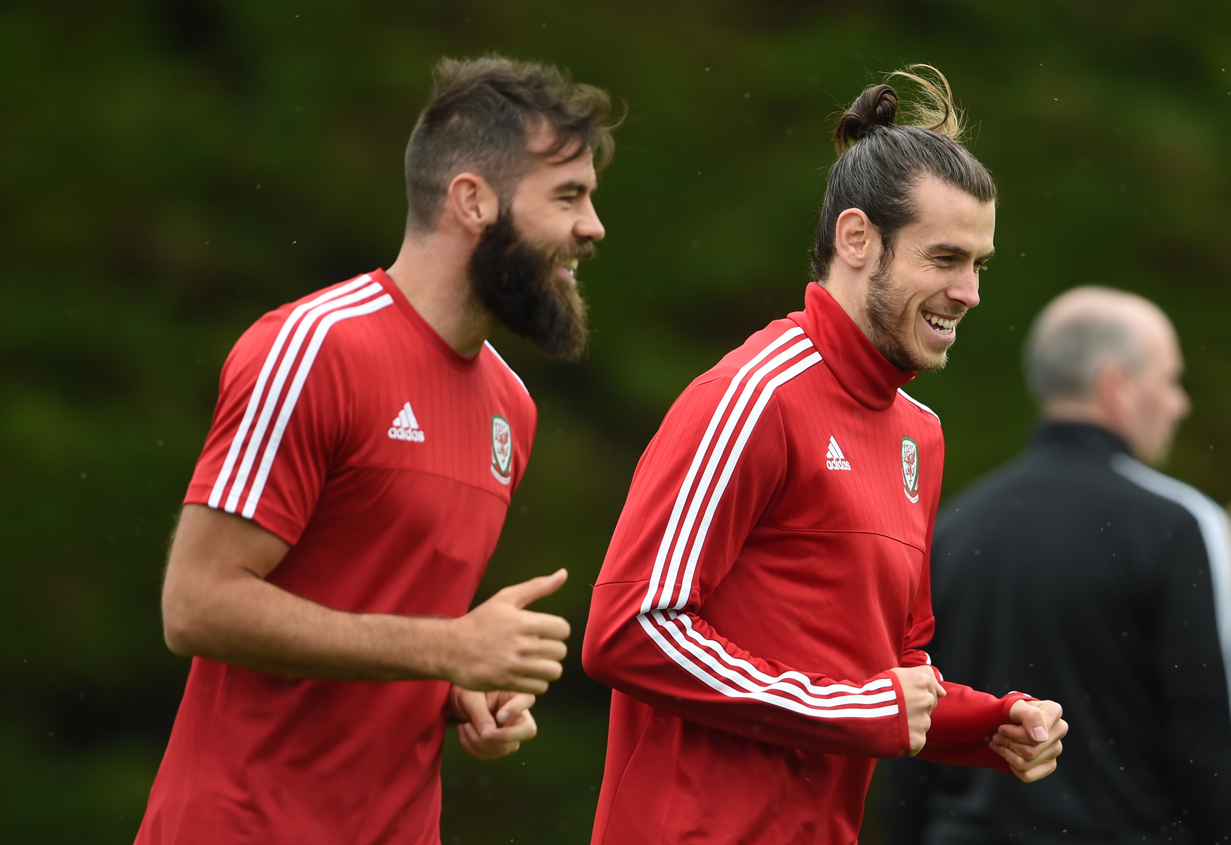 Former Wales midfielder Joe Ledley (left) says the country’s youngsters must handle the loss of Gareth Bale (right) in World Cup qualifiers (Joe Giddens/PA)