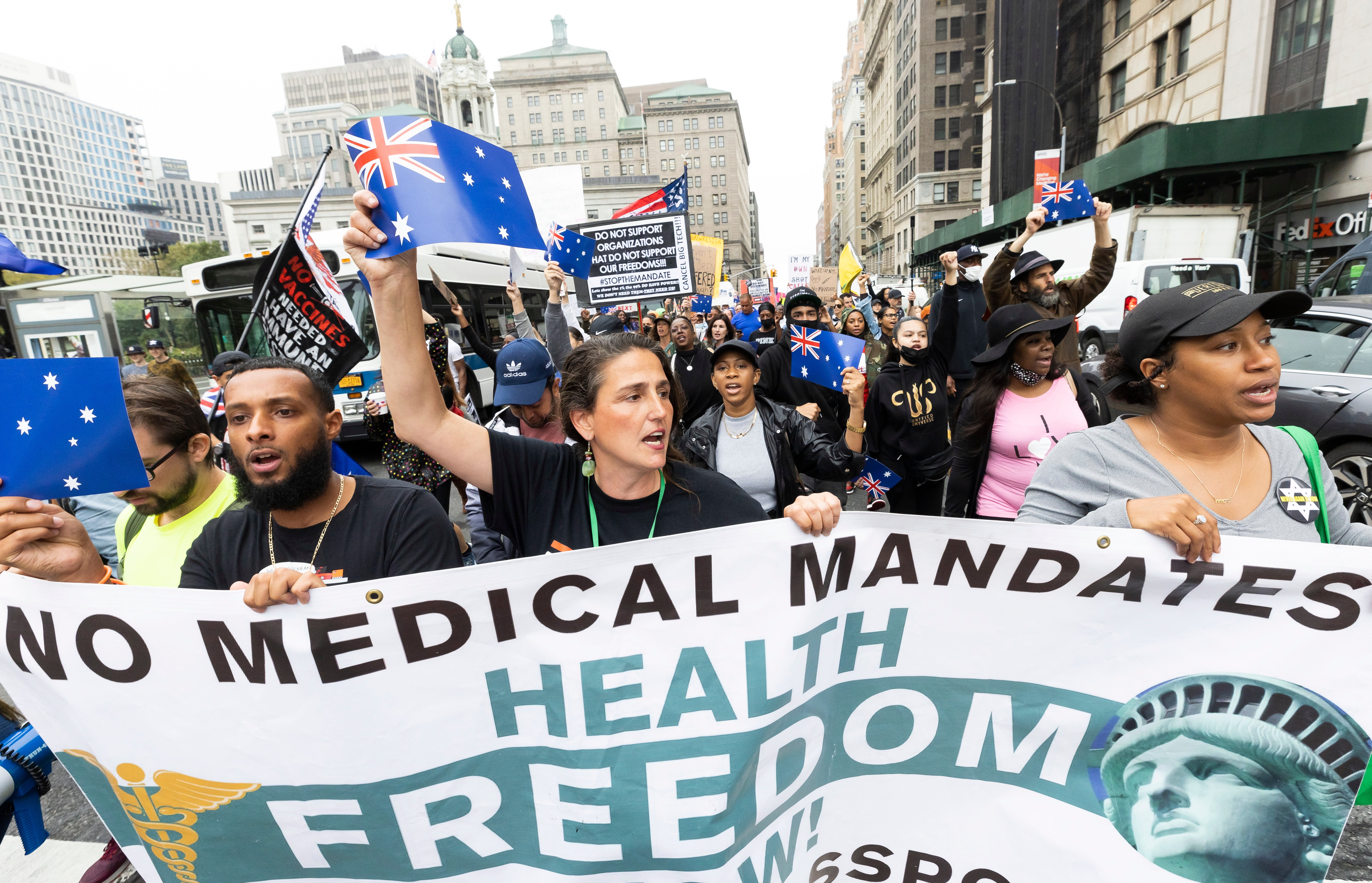 Public school teachers and supporters march during a protest against New York City’s Covid-19 vaccine mandate for public school employees, which went into effect on 4 October