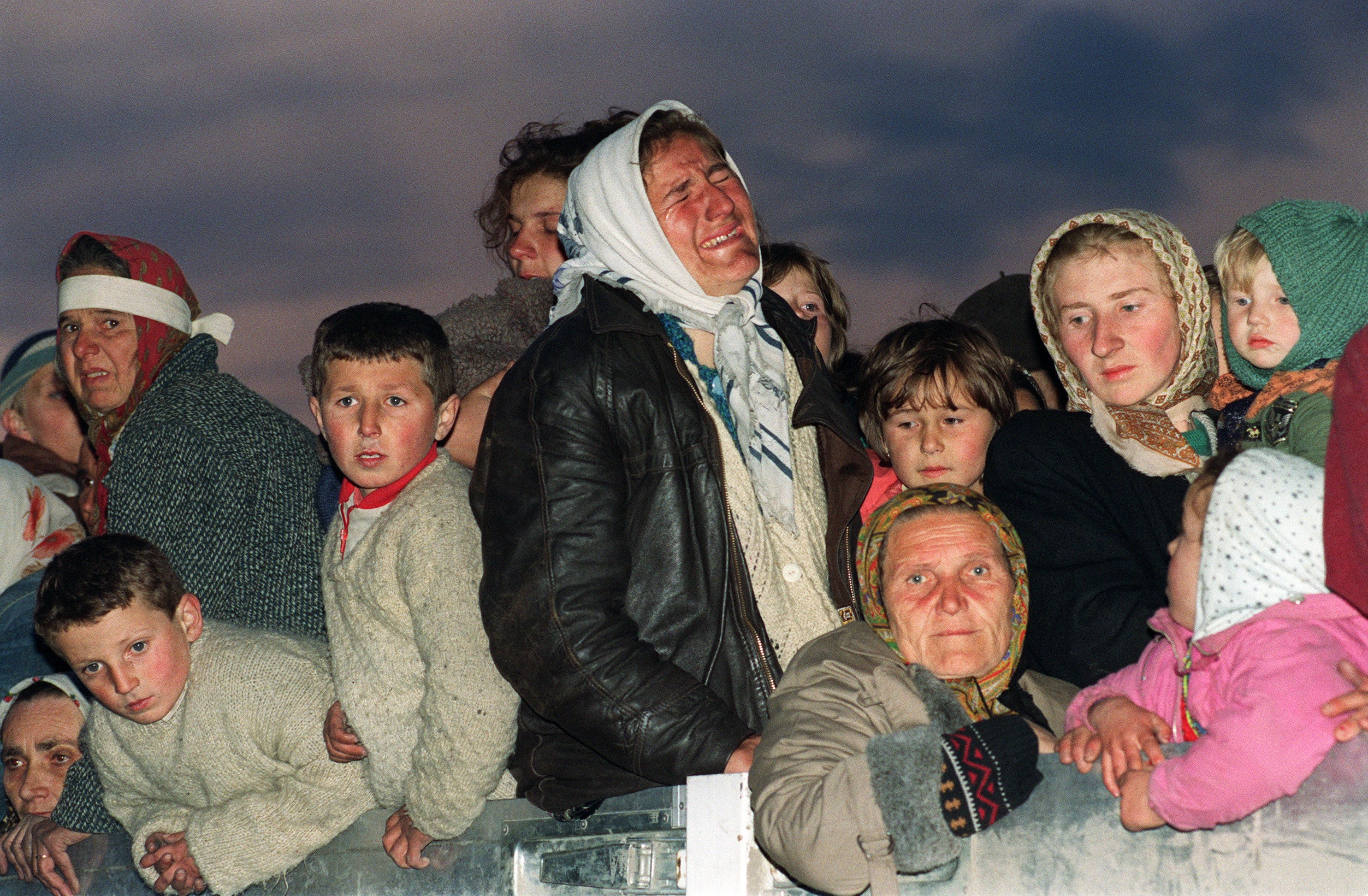 A female refugee from the Serb-besieged Bosnian enclave of Srebrenica bursts into tears upon her arrival in Tuzla in March 1993