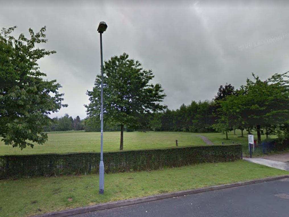 Police are hunting for a man after a woman was raped in a park behind a retail complex in Sutton Coldfield, Birmingham