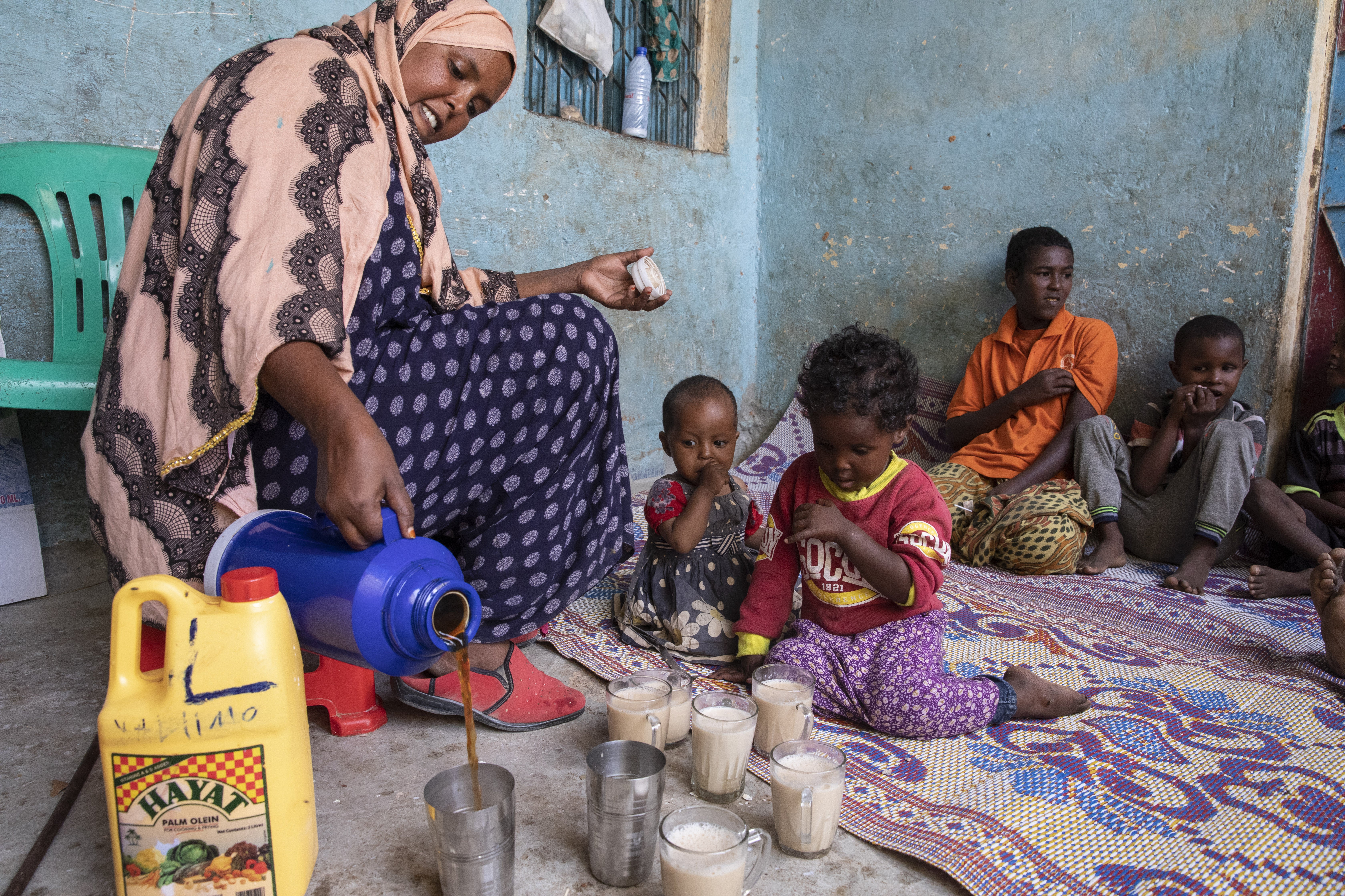 Khadra received $600 investment capital from Save the Children to open a tea shop, after she lost her livelihood as a farmer due to drought.