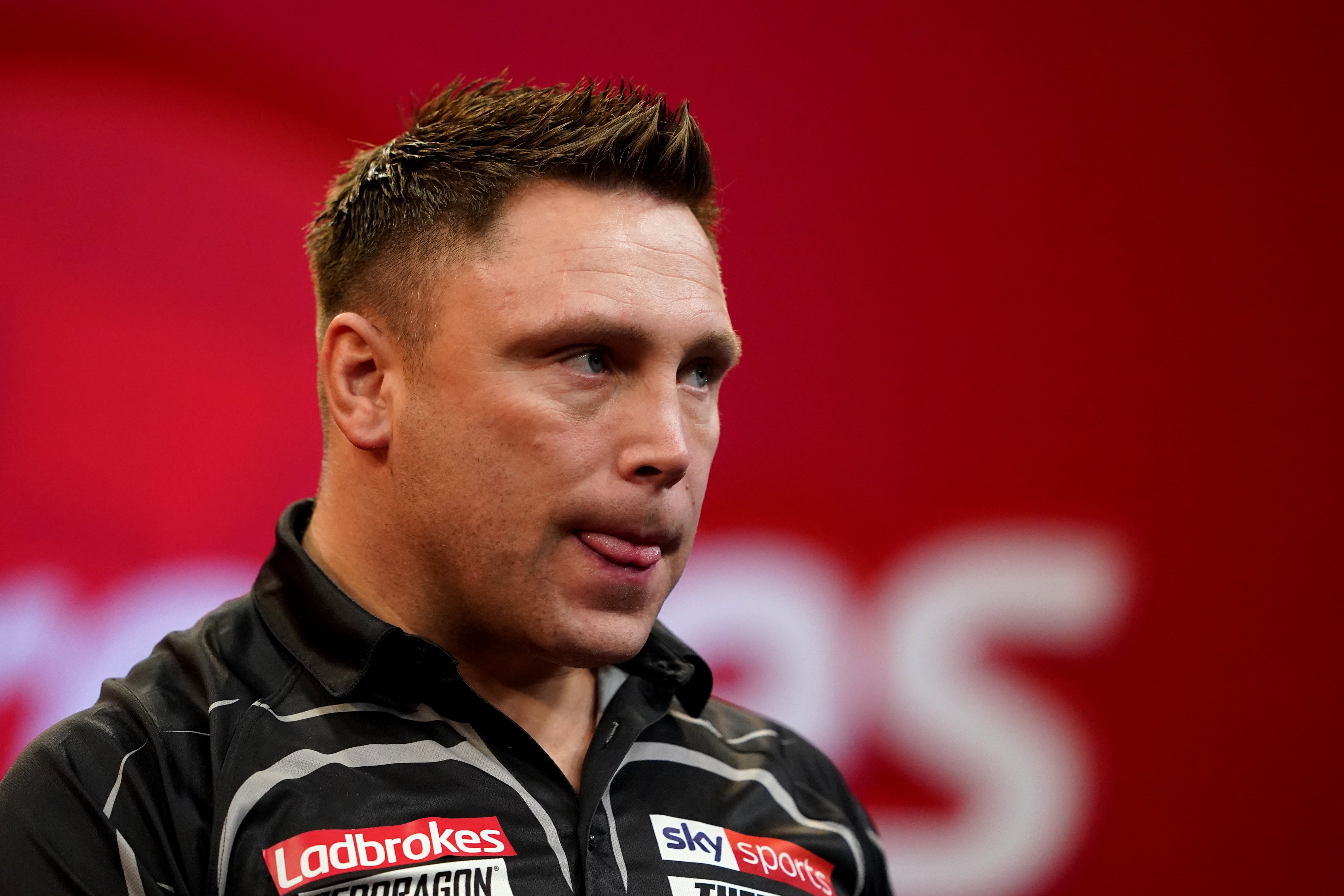 Welshman Gerwyn Price, the world champion, built momentum after losing the opening set (Zac Goodwin/PA)