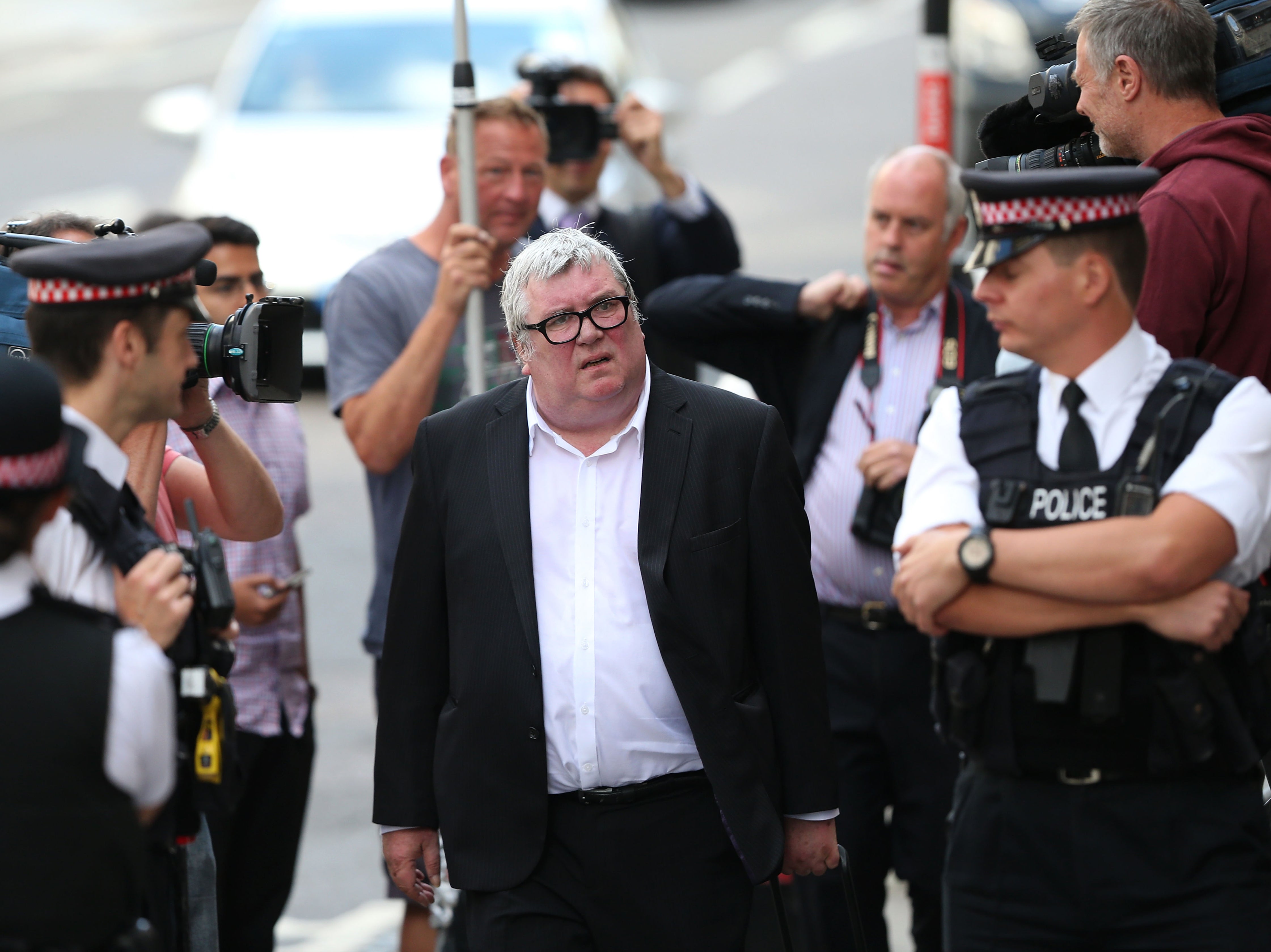 Arriving for sentencing at the Old Bailey in July 2014