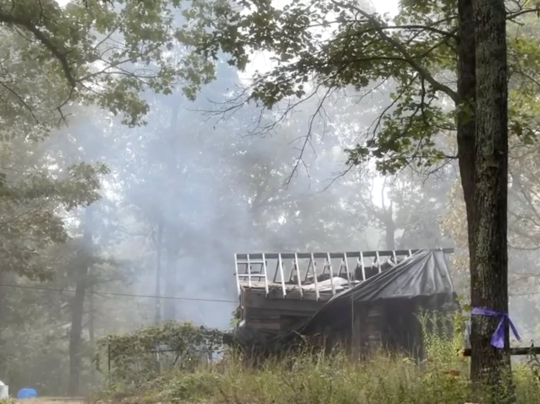 The remains of James Phelps’ Missouri home was still smouldering on Tuesday