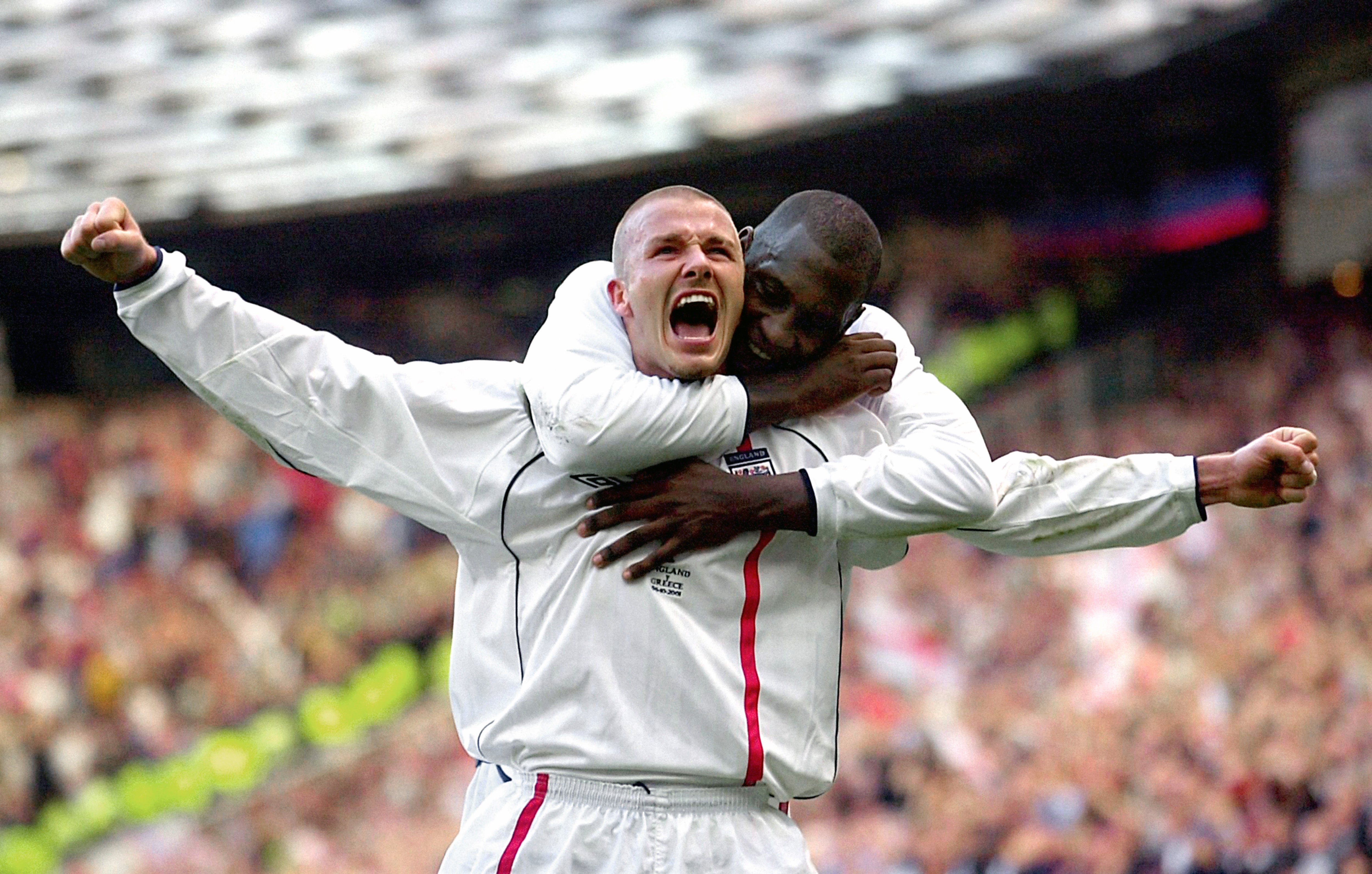 David Beckham celebrates his free-kick against Greece (Phil Noble/PA)