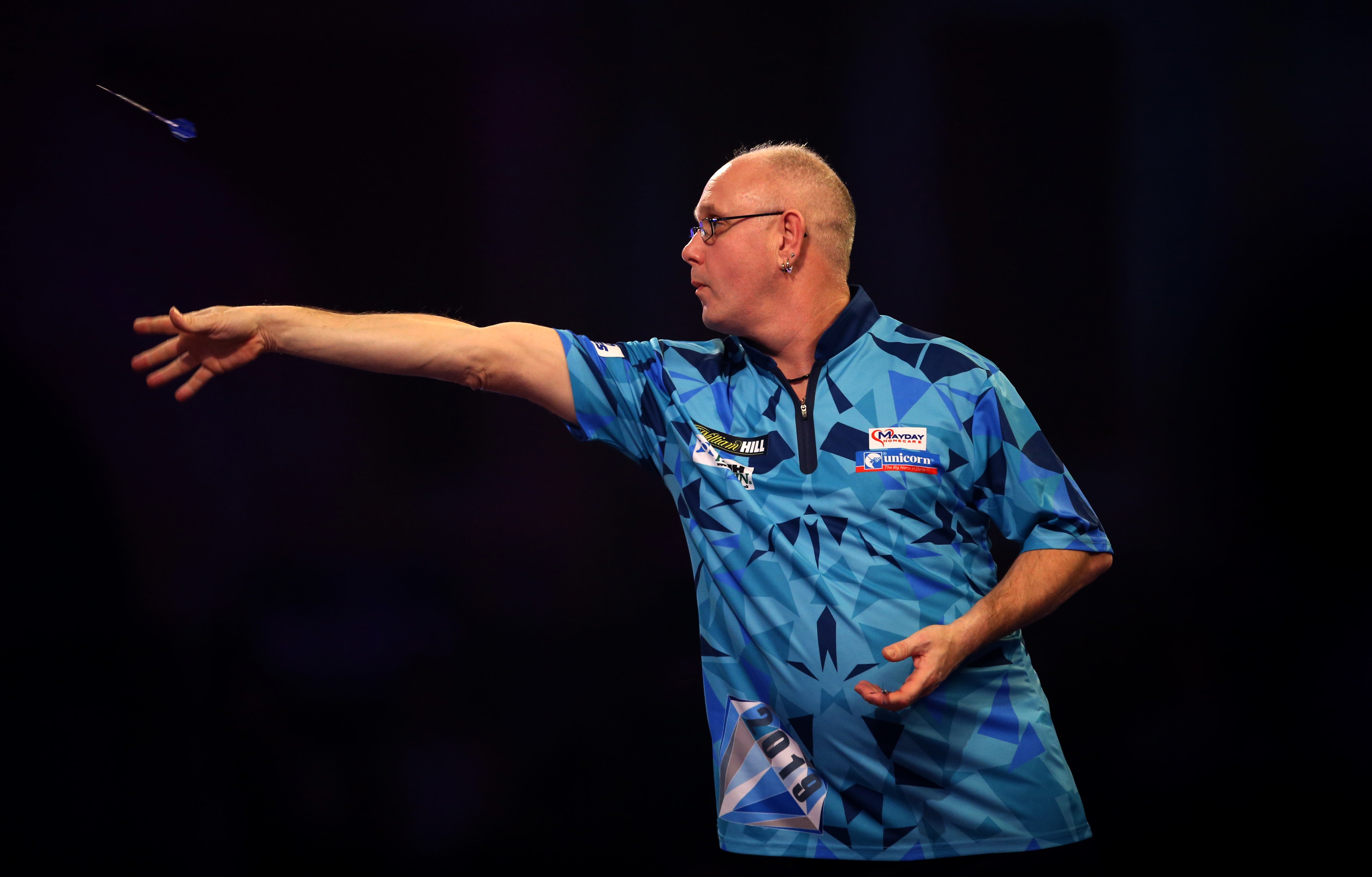 Ian White battled back from two sets down to win (Steven Paston/PA)