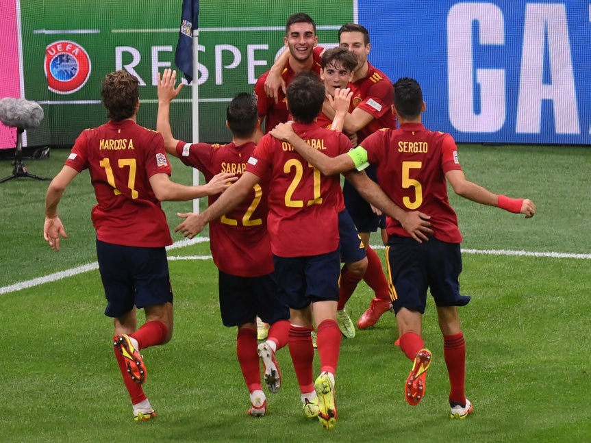 Spain celebrate Ferran Torres’s second goal