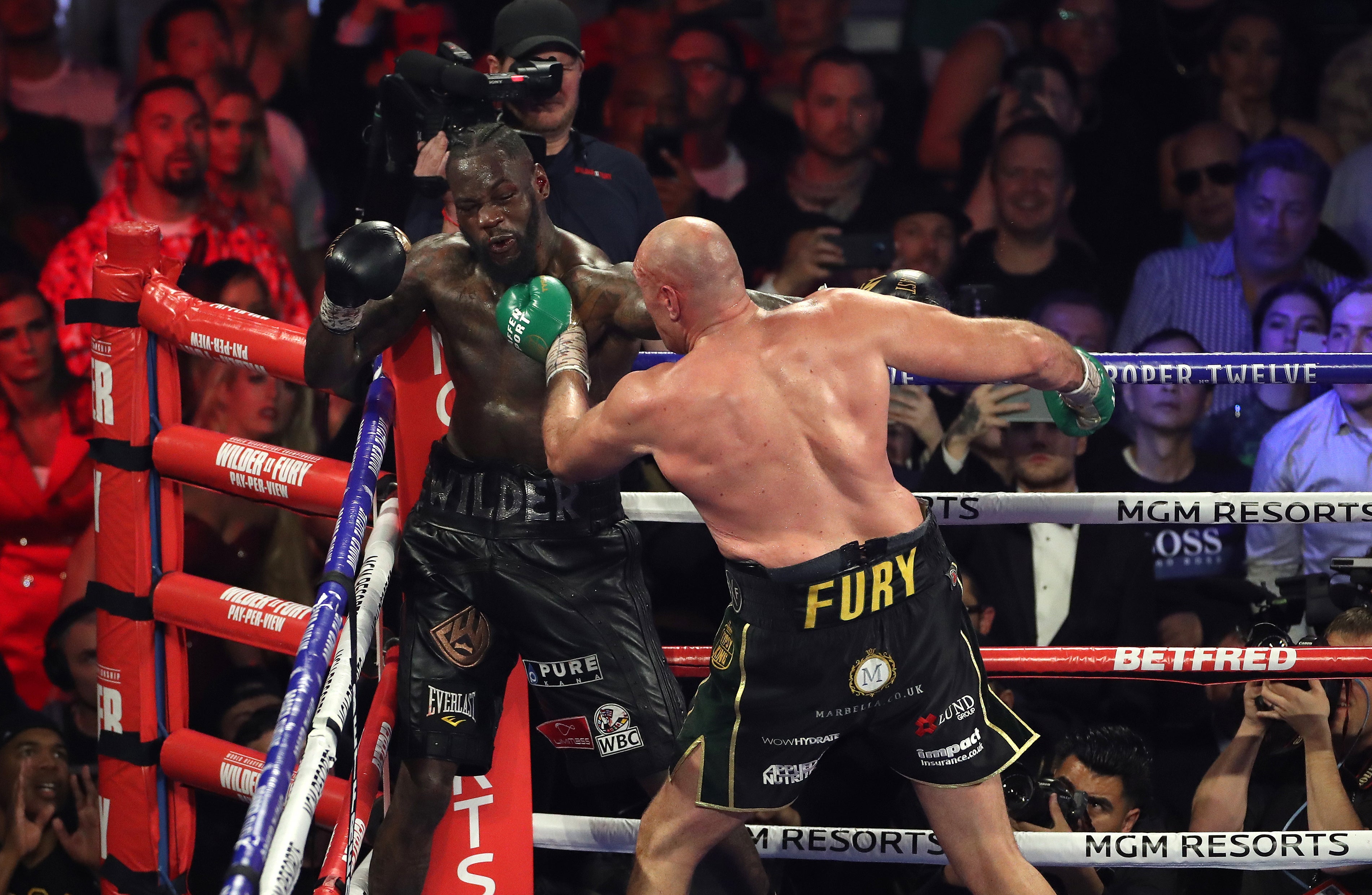 Tyson Fury (right) and Deontay Wilder during the WBC world heavyweight title bout in Las Vegas in February 2020 (Bradley Collyer/PA)