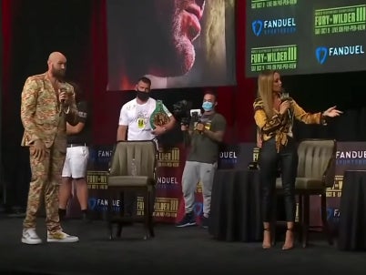 Kate Abdo attempts to make Tyson Fury and Deontay Wilder engage in a face-off