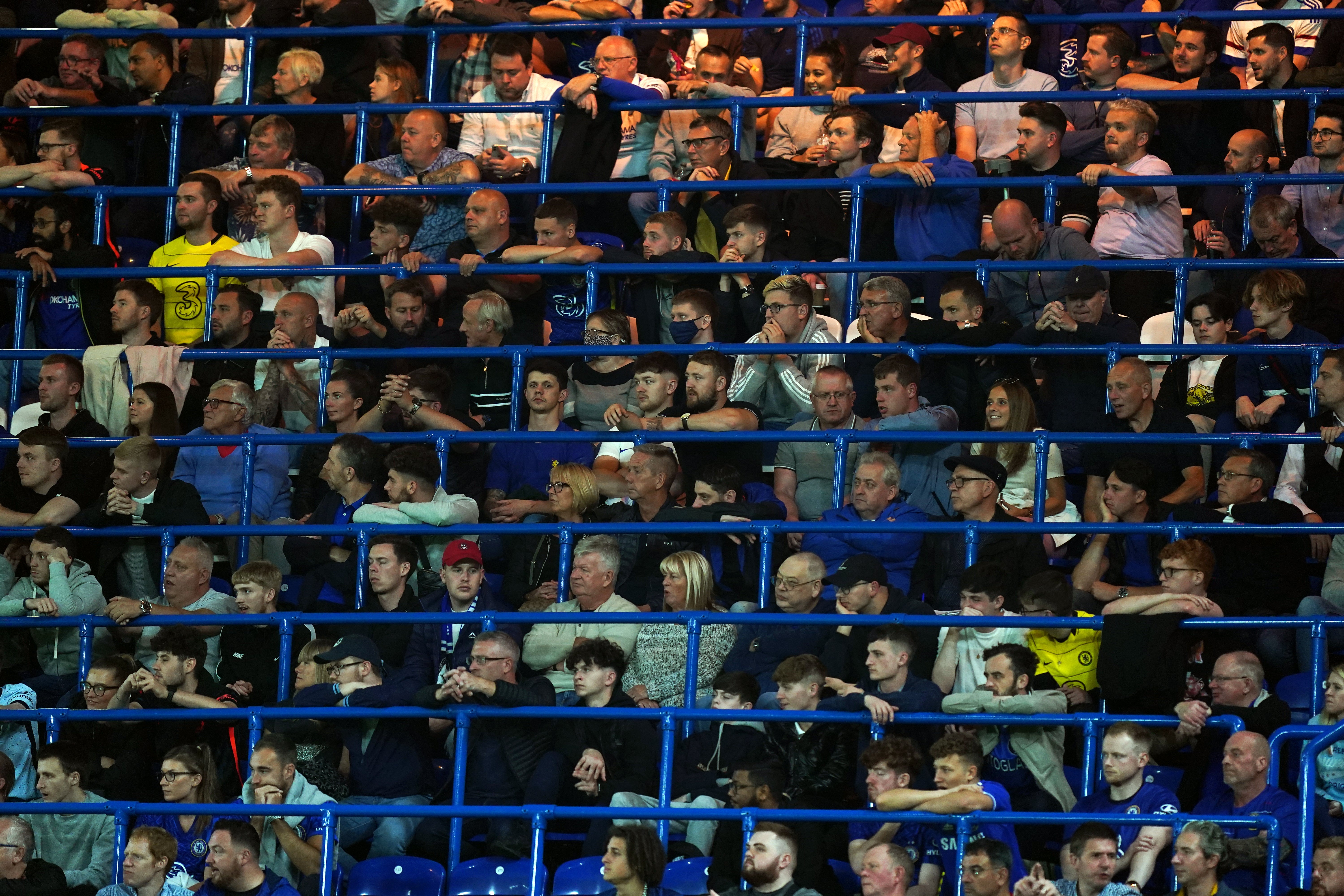 Fans watch the Chelsea v Aston Villa Carabao Cup tie from the safe standing area at Stamford Bridge (Mike Egerton/PA)