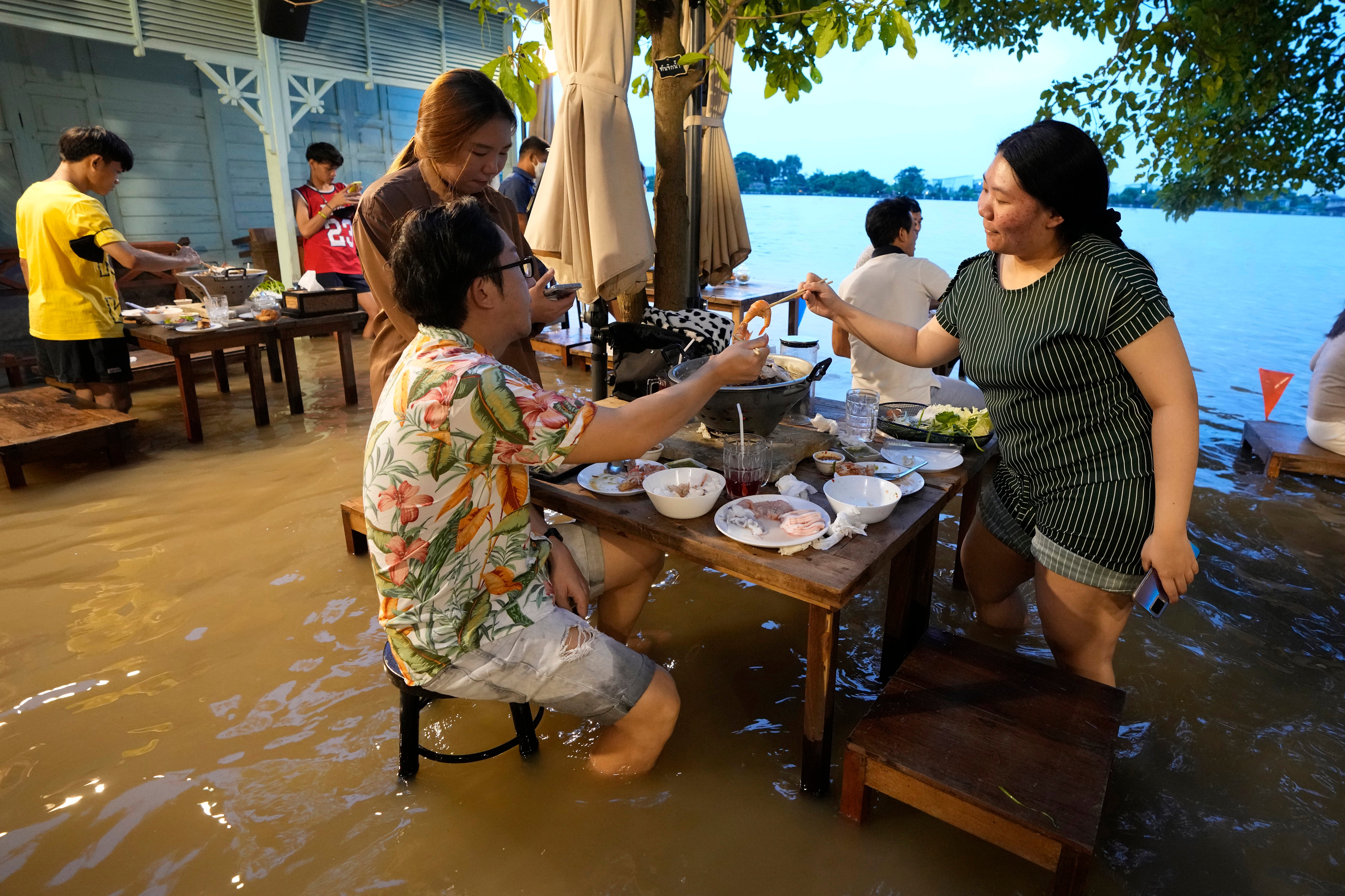 <p>The Pa Jit restaurant, located in Nakhon Pathom province, approximately 30 kilometres from Bangkok, has become an internet phenomenon since an adjacent river breached its banks</p>