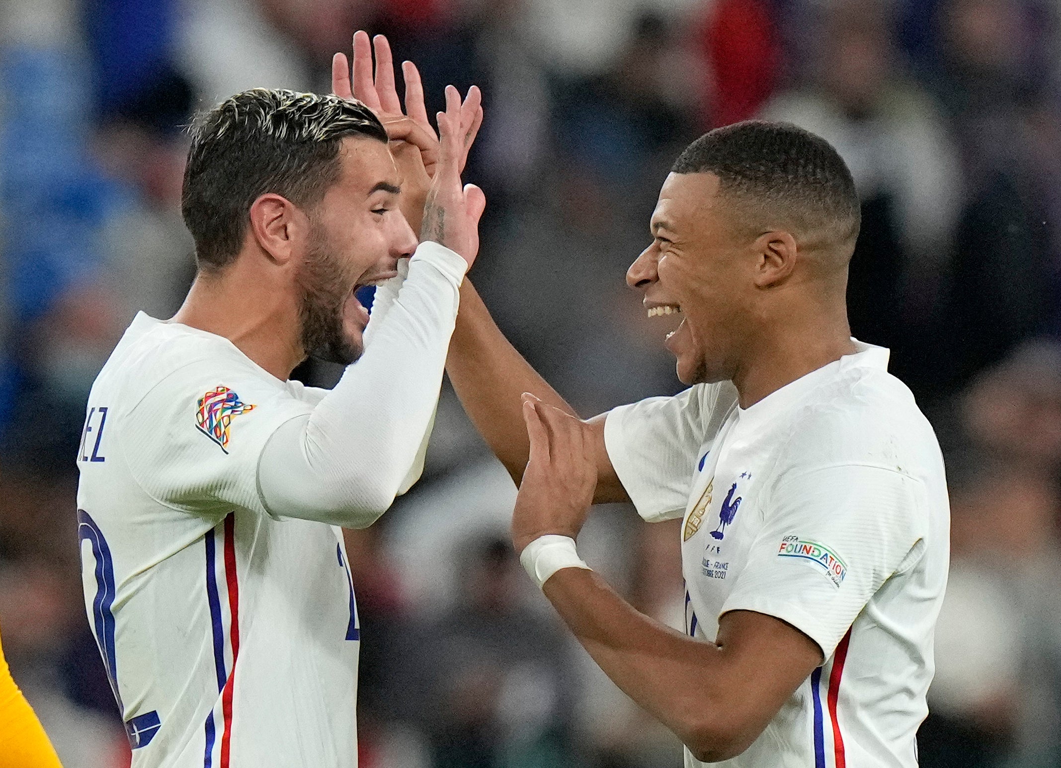 Theo Hernandez and Kylian Mbappe celebrate (Luca Bruno/PA)