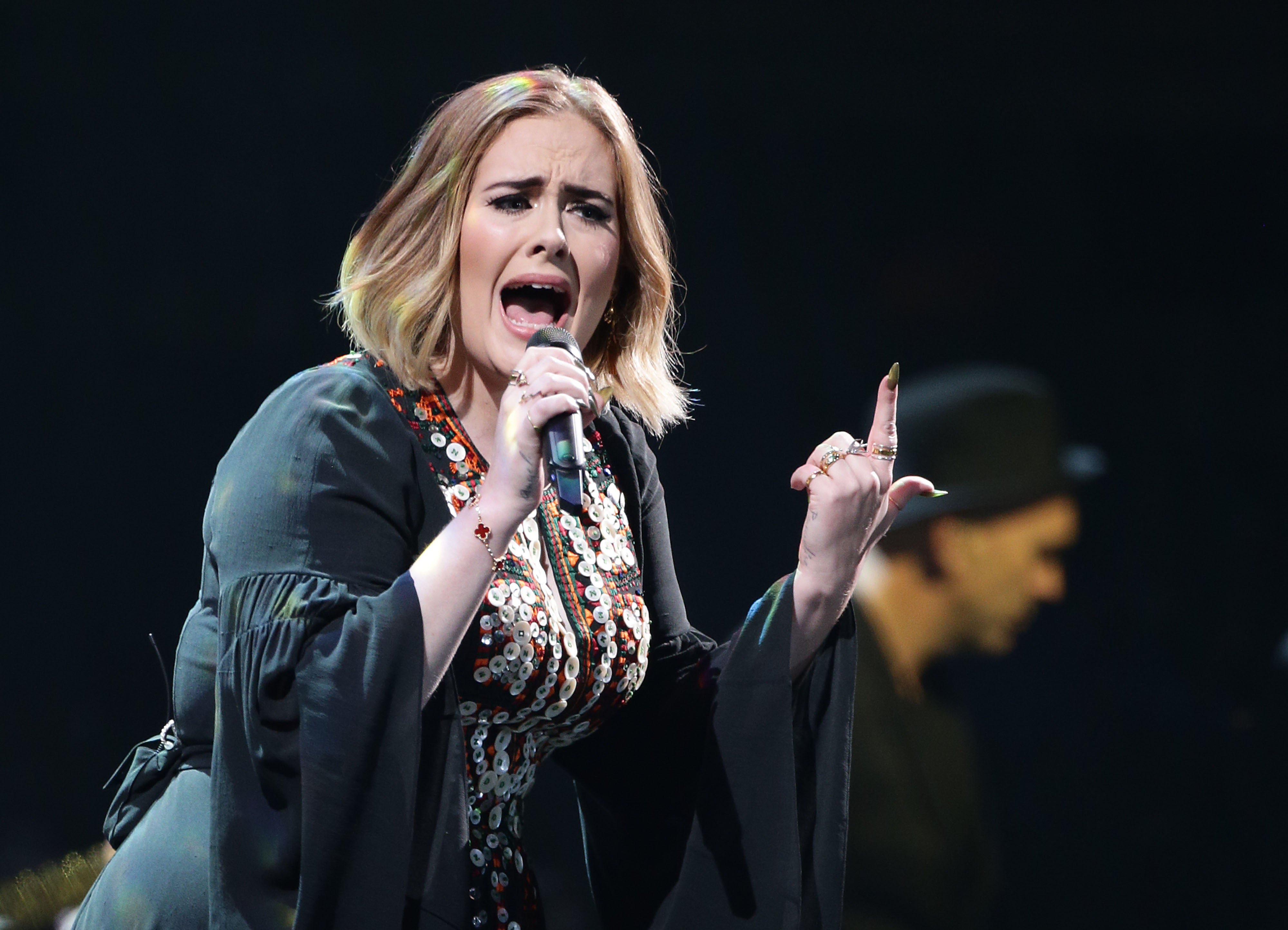 Adele performing on stage at the Glastonbury Festival (PA)